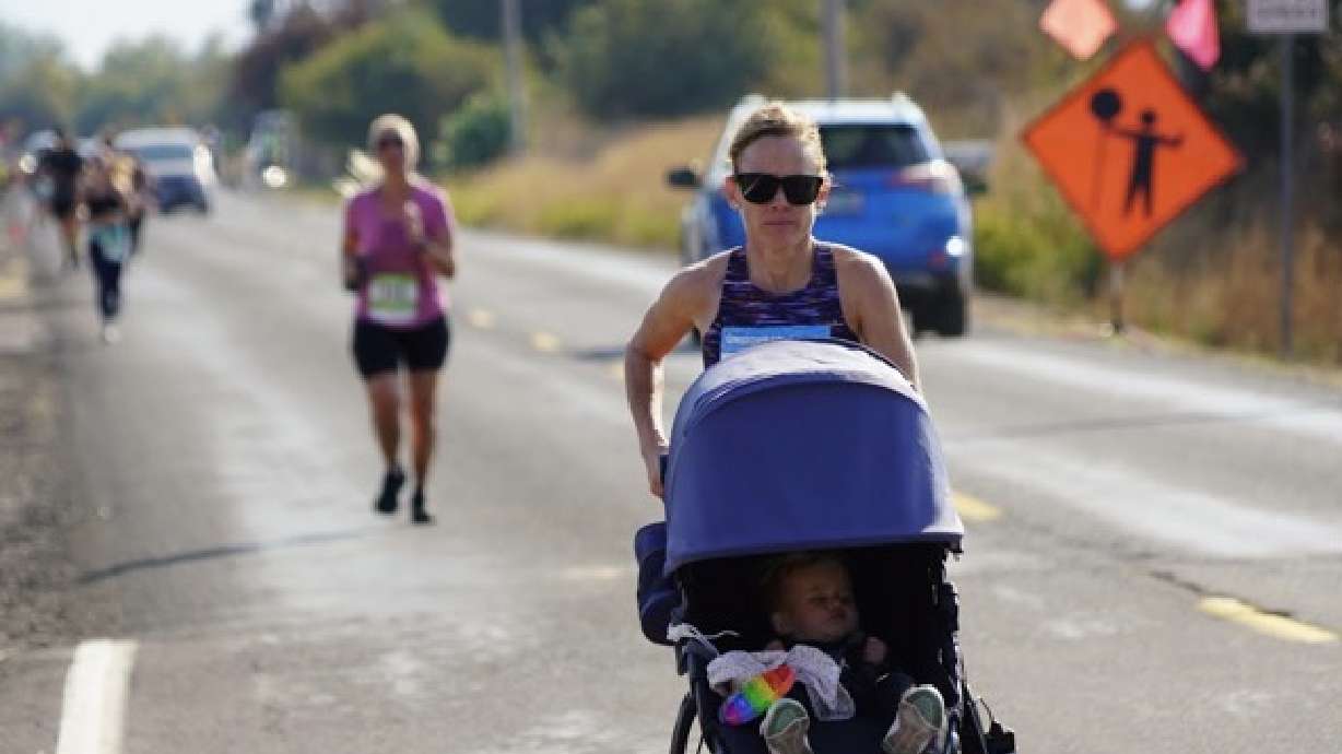 Alyssa Puttkammer took her 19-month-old daughter through her marathon on Sept. 16 in Oregon, breaking the record for a women's marathon while pushing a stroller.