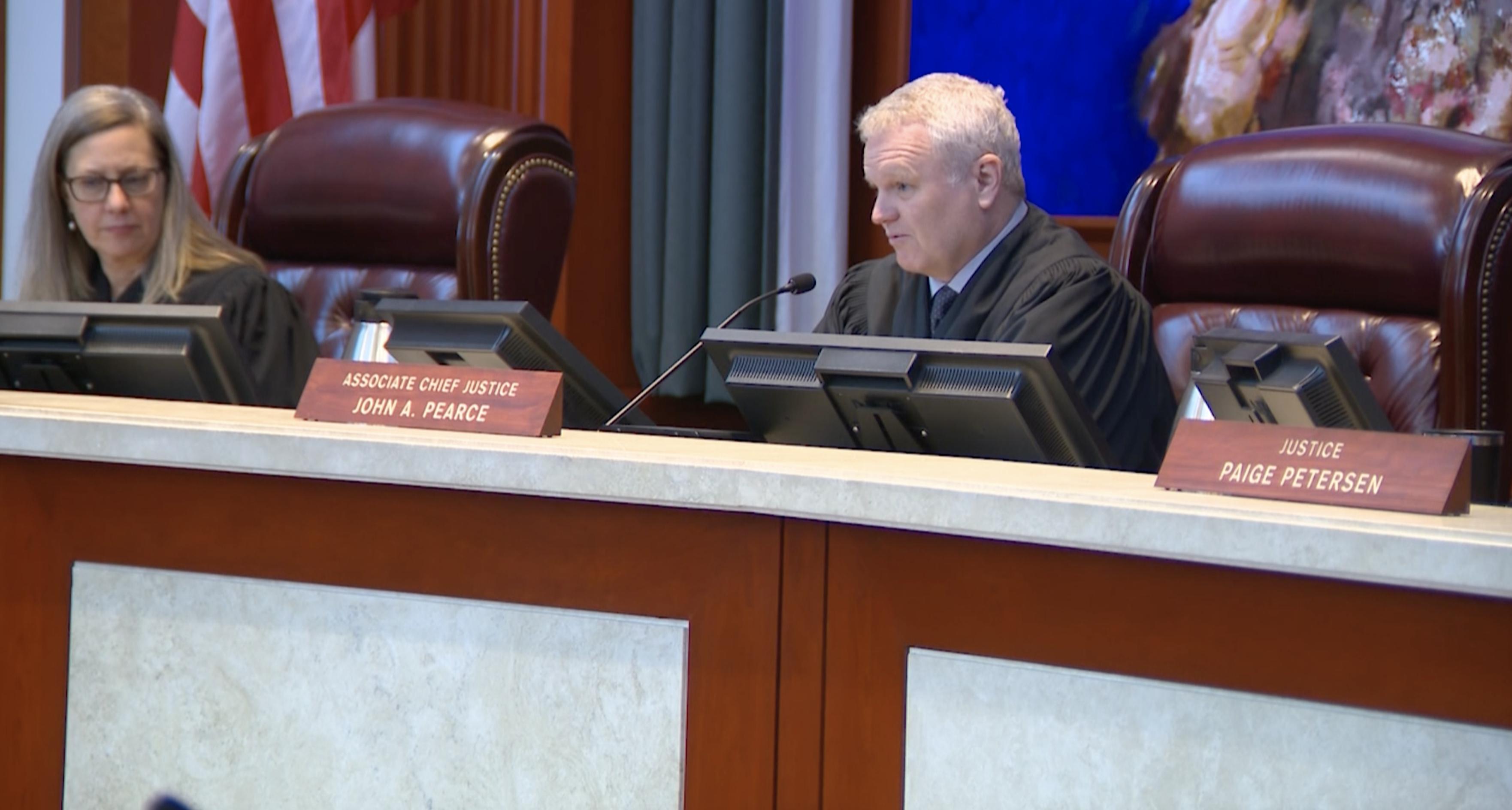Judge Michele Christiansen Forester and Associate Chief Justice of the Utah Supreme Court John Pearce listen to arguments on Oct. 20, 2023. Pearce has announced he is leaving his position on the state's high court.