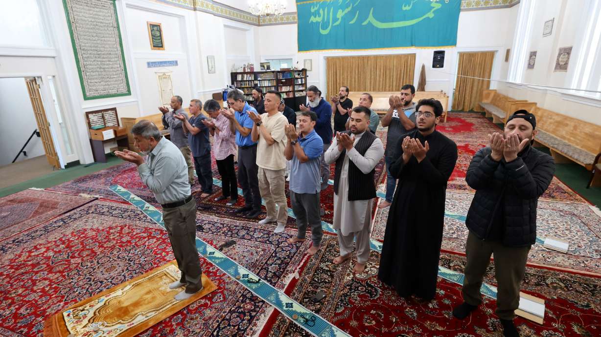 Men pray at Alrasool Islamic Center of Utah in Taylorsville on Friday. The Alrasool Islamic Center has received a grant from the National Fund for Sacred Places to help restore the historic building.