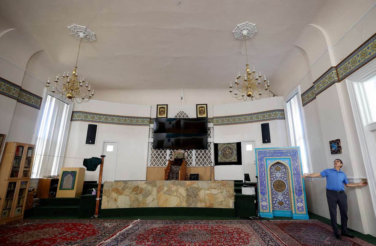 Hassan Mardanlou shows cracks in the ceiling at Alrasool Islamic Center of Utah in Taylorsville on Friday. The Alrasool Islamic Center has received a grant from the National Fund for Sacred Places to help restore the historic building.
