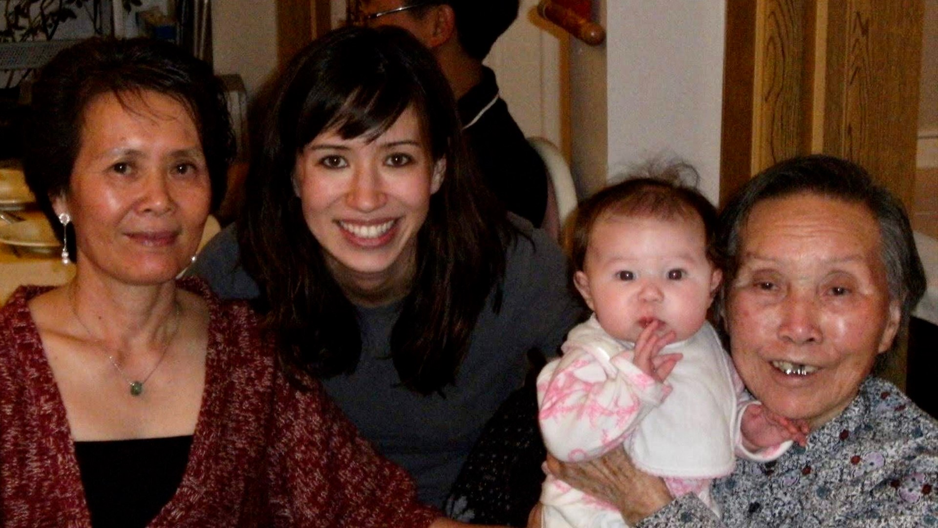 Four generations of Lam’s family are pictured together. Lam has added the ancient Chinese practice of qigong, which her Chinese grandmother did, to her mindfulness practices which have brought her sustained happiness for the first time in a long time.