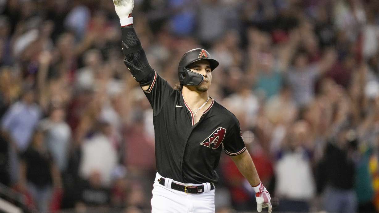 Arizona Diamondbacks' Alek Thomas rounds the bases after a two-run home run against the Philadelphia Phillies during the eighth inning in Game 4 of the baseball NL Championship Series in Phoenix, Friday, Oct. 20, 2023.