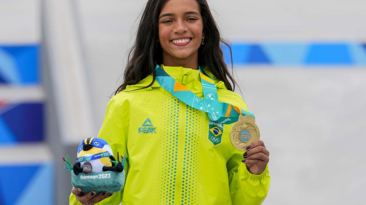 Brazil's Rayssa Leal shows the gold medal during the awards ceremony of the women's skateboarding street at the Pan American Games in Santiago, Chile, Saturday, Oct. 21, 2023.