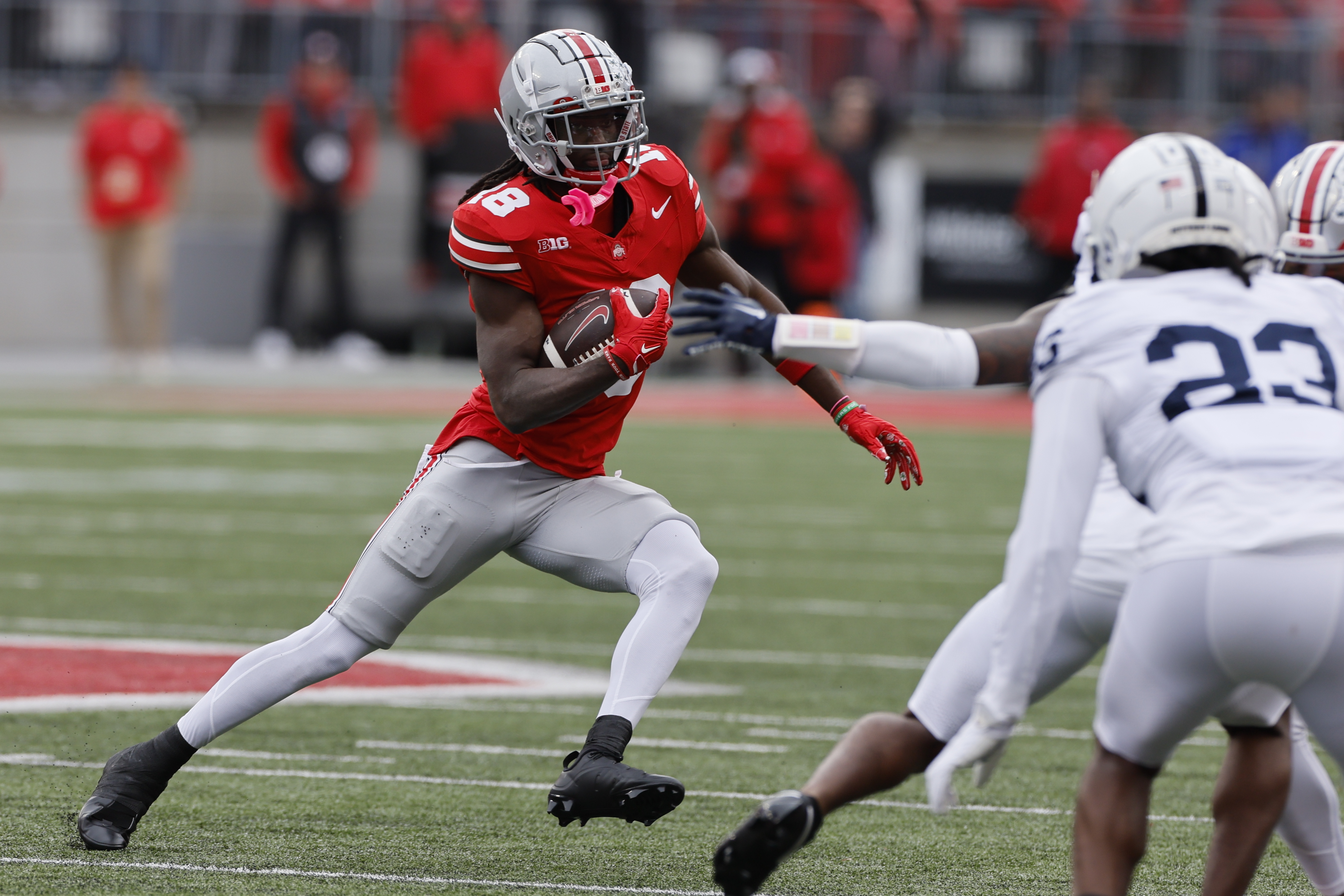 Ohio State receiver Marvin Harrison runs after a catch against Penn State during the first half of an NCAA college football game Saturday, Oct. 21, 2023, in Columbus, Ohio.
