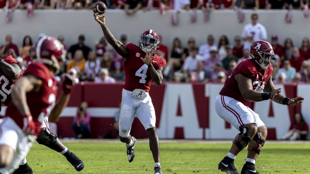 Alabama quarterback Jalen Milroe (4) throws a pass against Tennessee during the first half of an NCAA college football game, Saturday, Oct. 21, 2023, in Tuscaloosa, Ala.