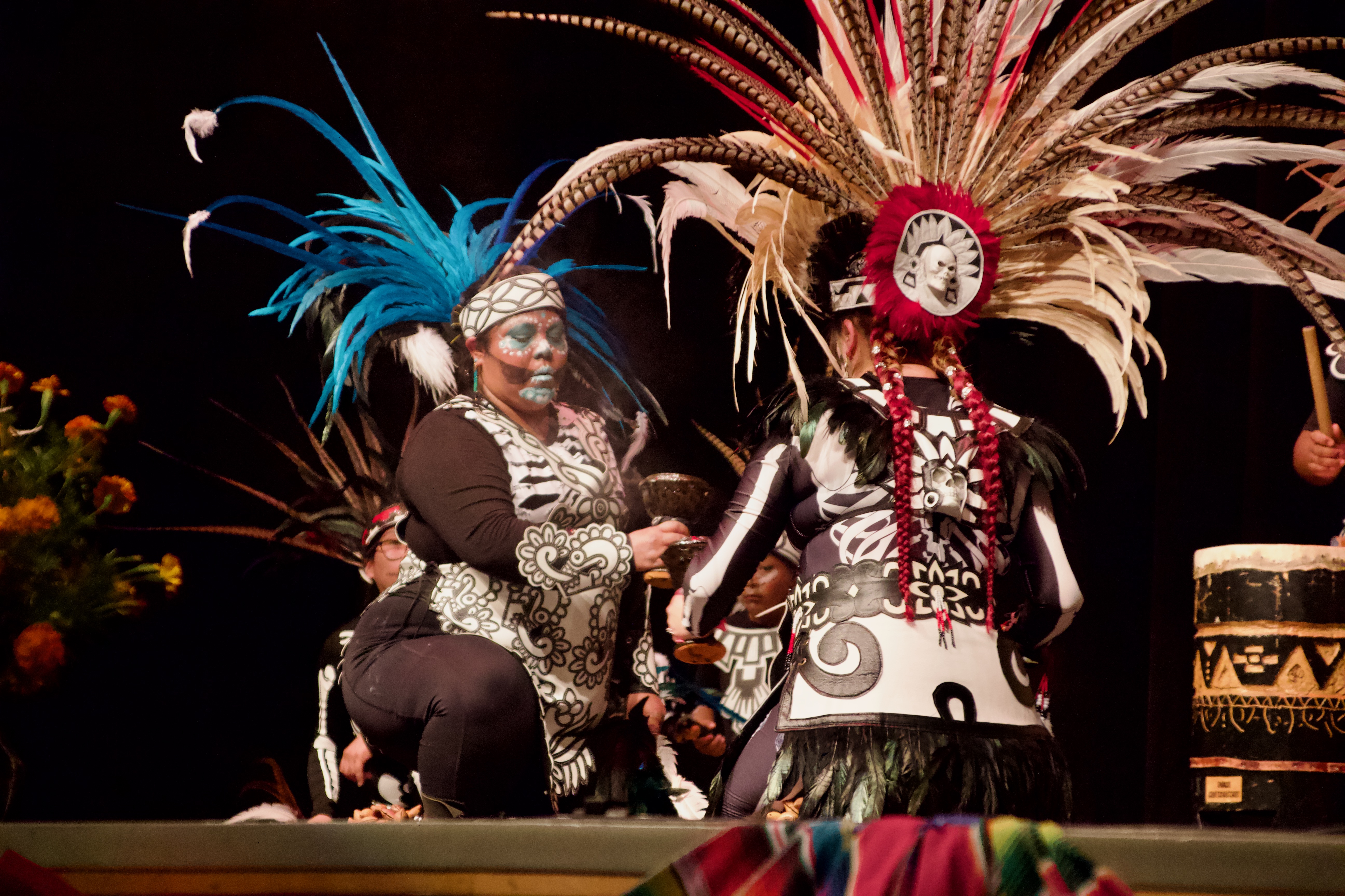 Members of Danza Azteca Quetzalcoatl perform at Día de los Muertos en Ogden at Ben Lomond High School on Saturday.