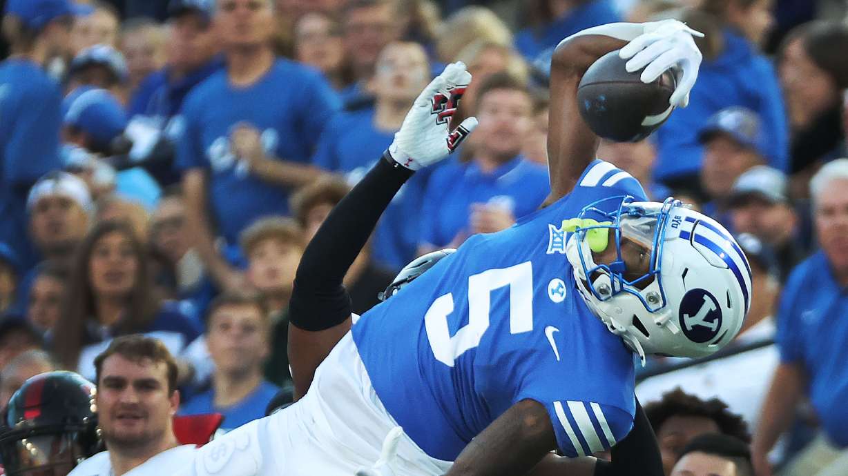 Brigham Young wide receiver Darius Lassiter (5) makes a one-handed catch against the Texas Tech Red Raiders in Provo on Saturday, Oct. 21, 2023. BYU won 27-14.