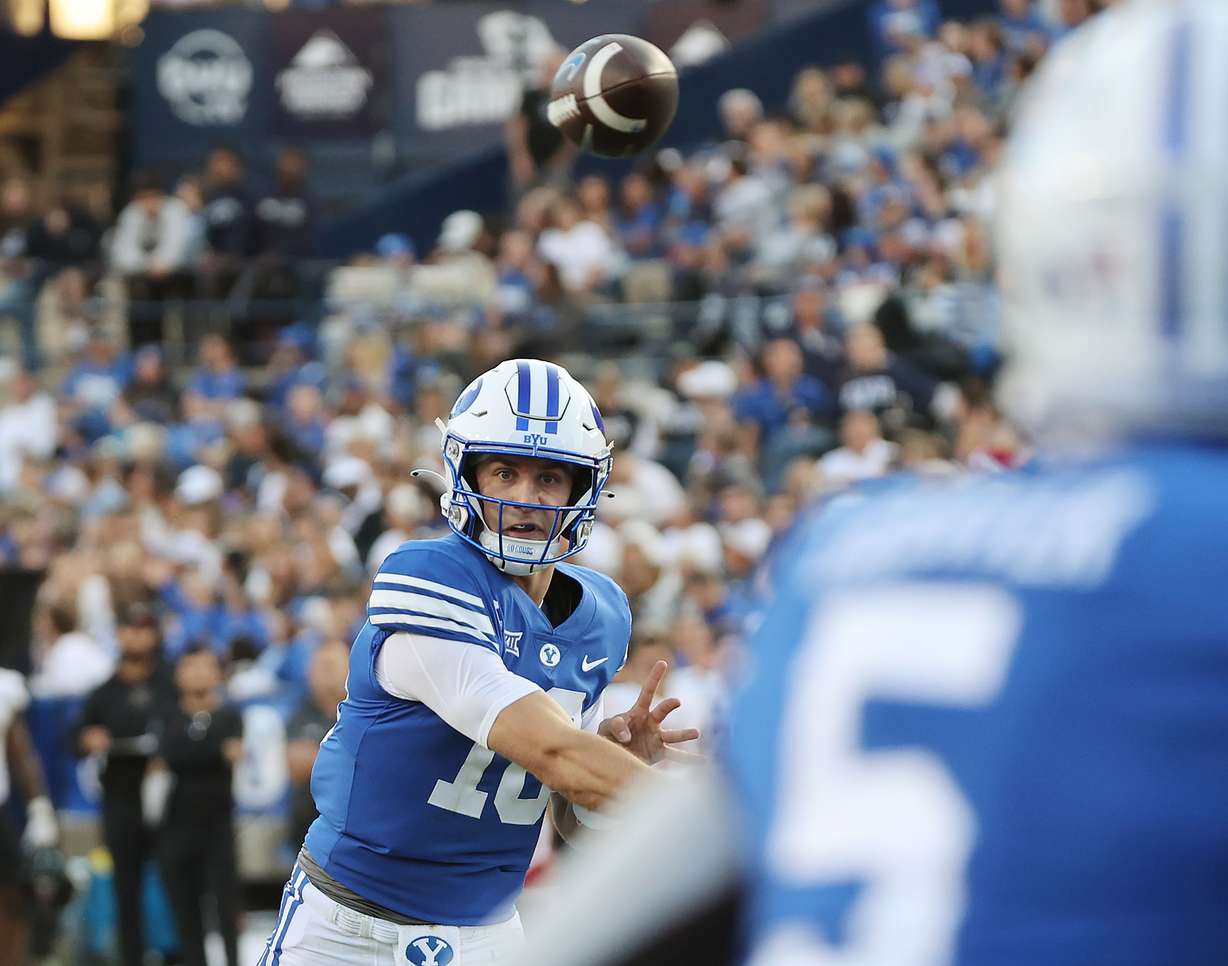 Brigham Young quarterback Kedon Slovis (10) throws a touchdown against the Texas Tech Red Raiders in Provo on Saturday, Oct. 21, 2023. BYU won 27-14.