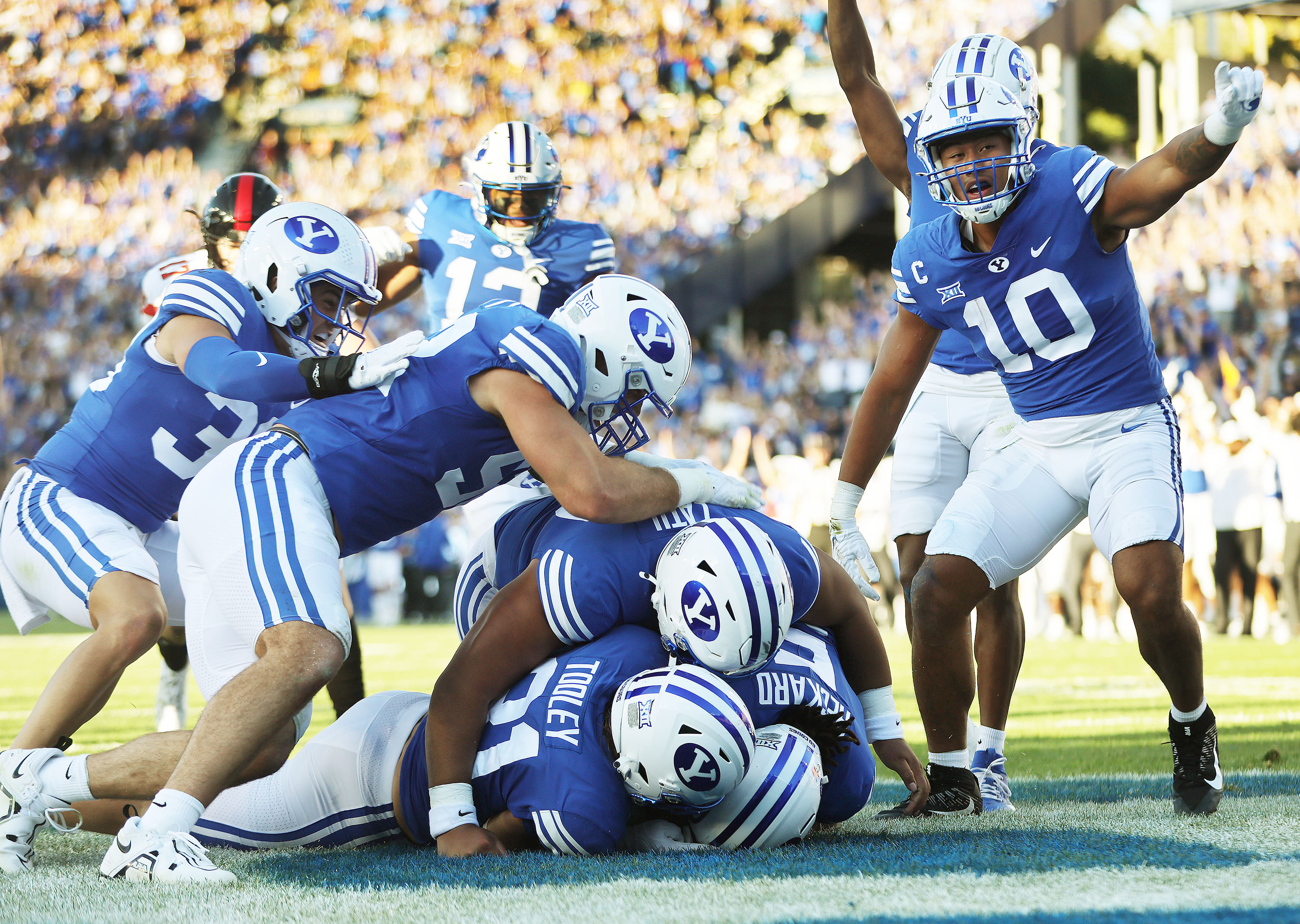 Brigham Young cornerback Eddie Heckard (5) recovers a fumble for a touchdown against the Texas Tech Red Raiders in Provo on Saturday, Oct. 21, 2023. BYU won 27-14.