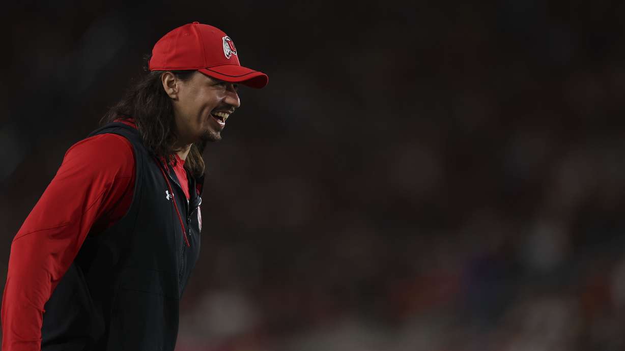 Utah’s Cam Rising celebrates after a play against the USC Trojans at the Los Angeles Memorial Coliseum on Saturday, Oct. 21, 2023.