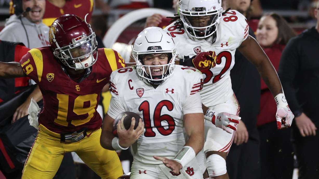 Utah Utes quarterback Bryson Barnes (16) drives against the USC Trojans at the Los Angeles Memorial Coliseum on Saturday, Oct. 21, 2023.