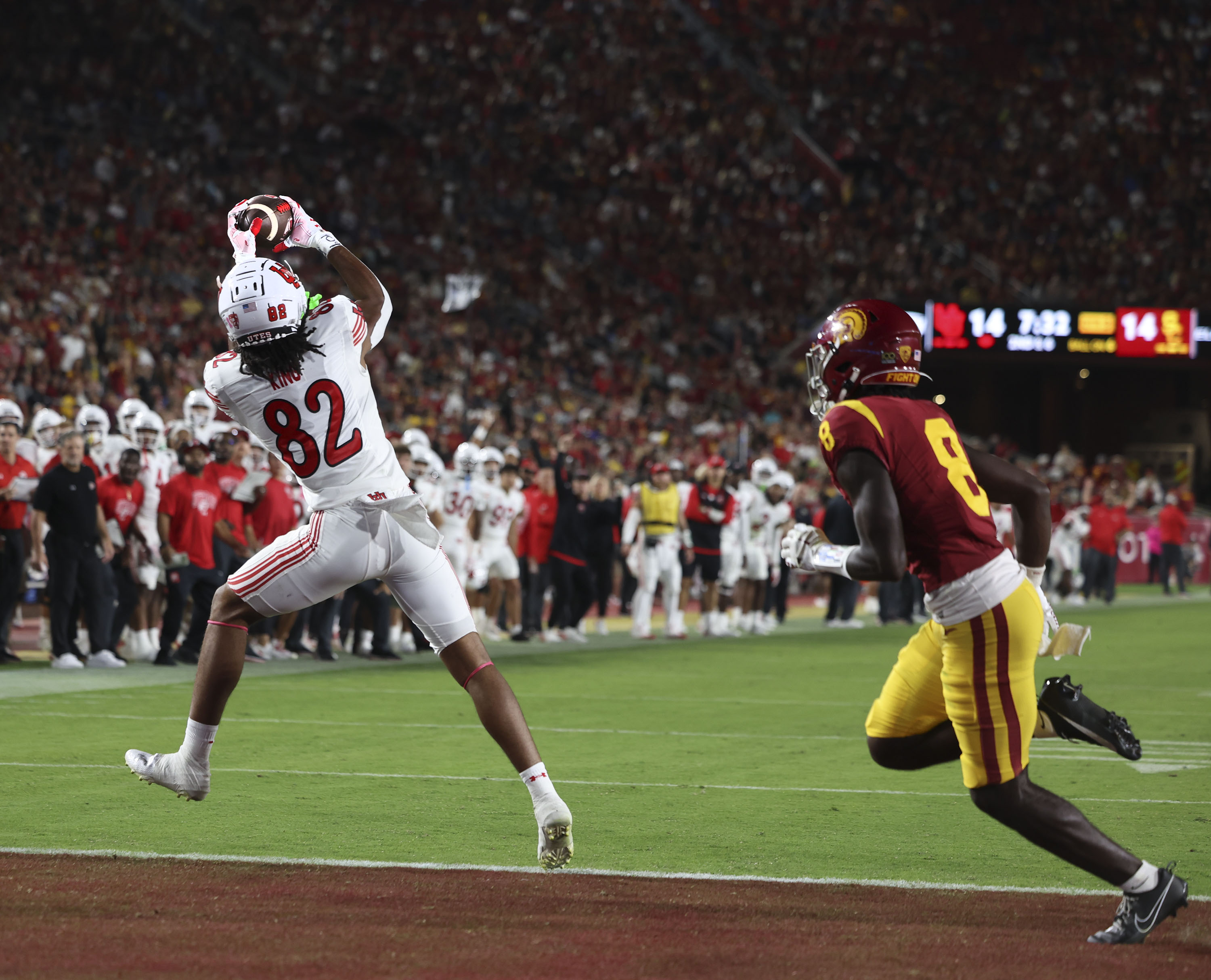 Utah’s Landen King catches a pass and scores against USC at the Los Angeles Memorial Coliseum on Saturday, Oct. 21, 2023.