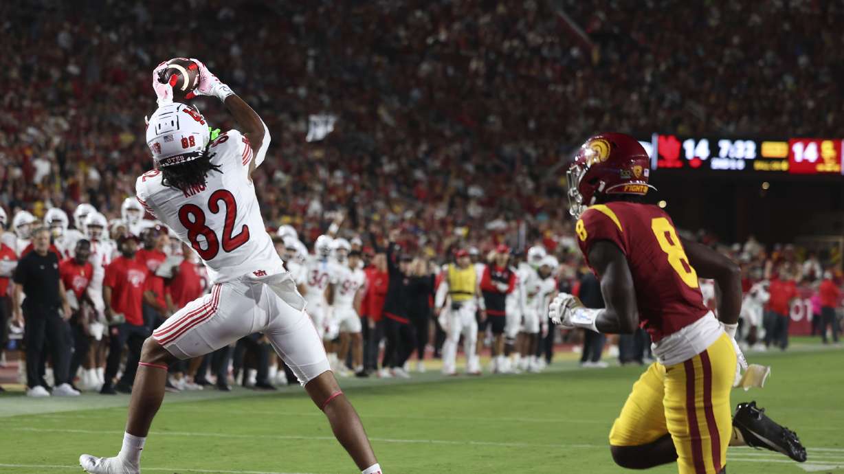 Utah’s Landen King catches a pass and scores against USC at the Los Angeles Memorial Coliseum on Saturday, Oct. 21, 2023.