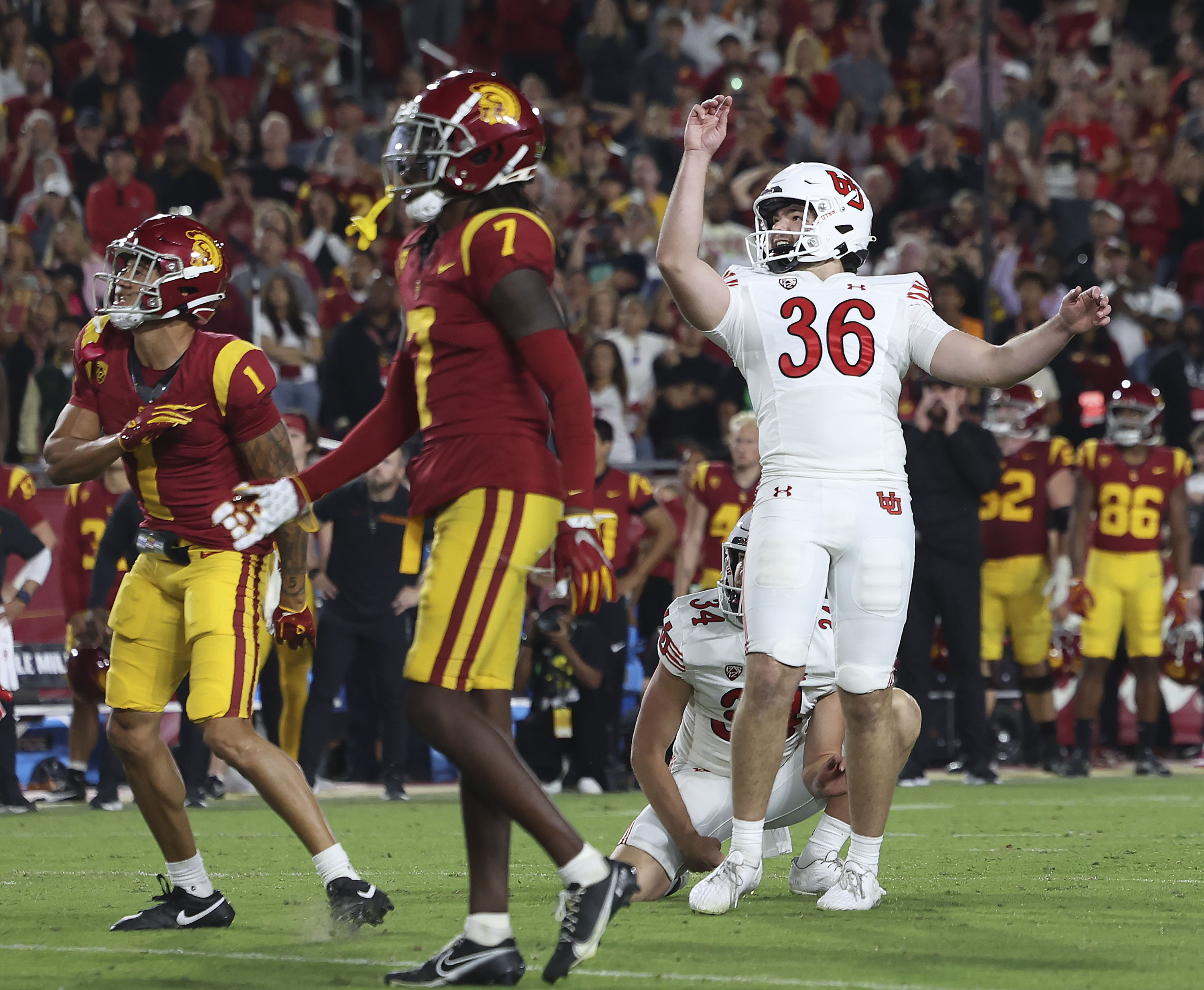 Utah Utes place kicker Cole Becker (36) watches as his field goal attempt goes in and wins the game against the USC Trojans at the Los Angeles Memorial Coliseum on Saturday, Oct. 21, 2023.