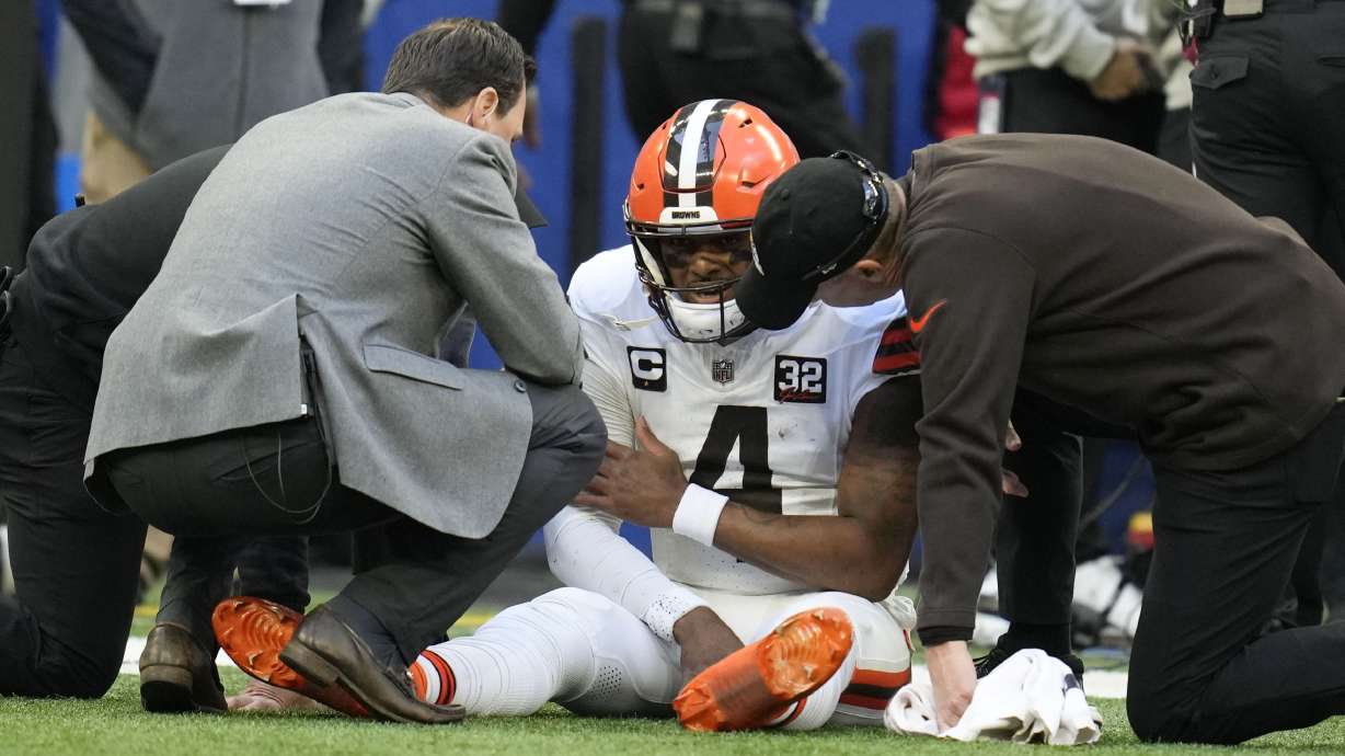 Cleveland Browns quarterback Deshaun Watson (4) sits on the field after getting injured during the first half of an NFL football game against the Indianapolis Colts, Sunday, Oct. 22, 2023, in Indianapolis.