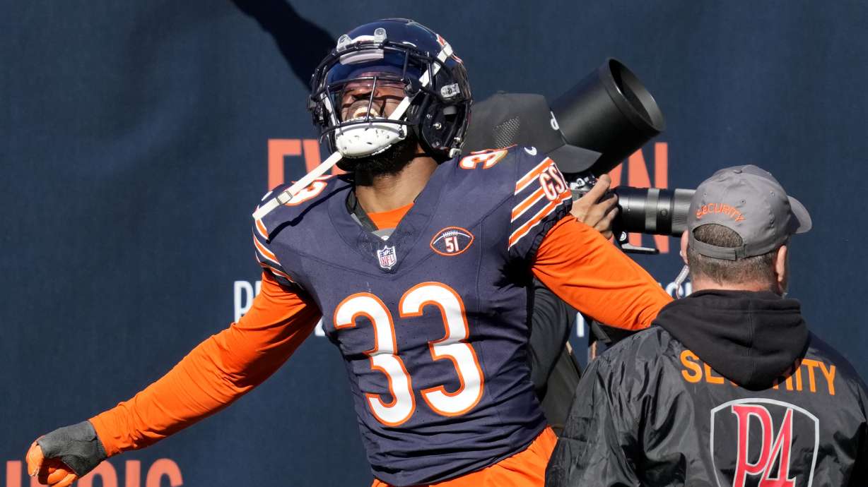 Chicago Bears cornerback Jaylon Johnson celebrates after intercepting a pass and returning it 39 yards for a touchdown against the Las Vegas Raiders in the second half of an NFL football game Sunday, Oct. 22, 2023, in Chicago.