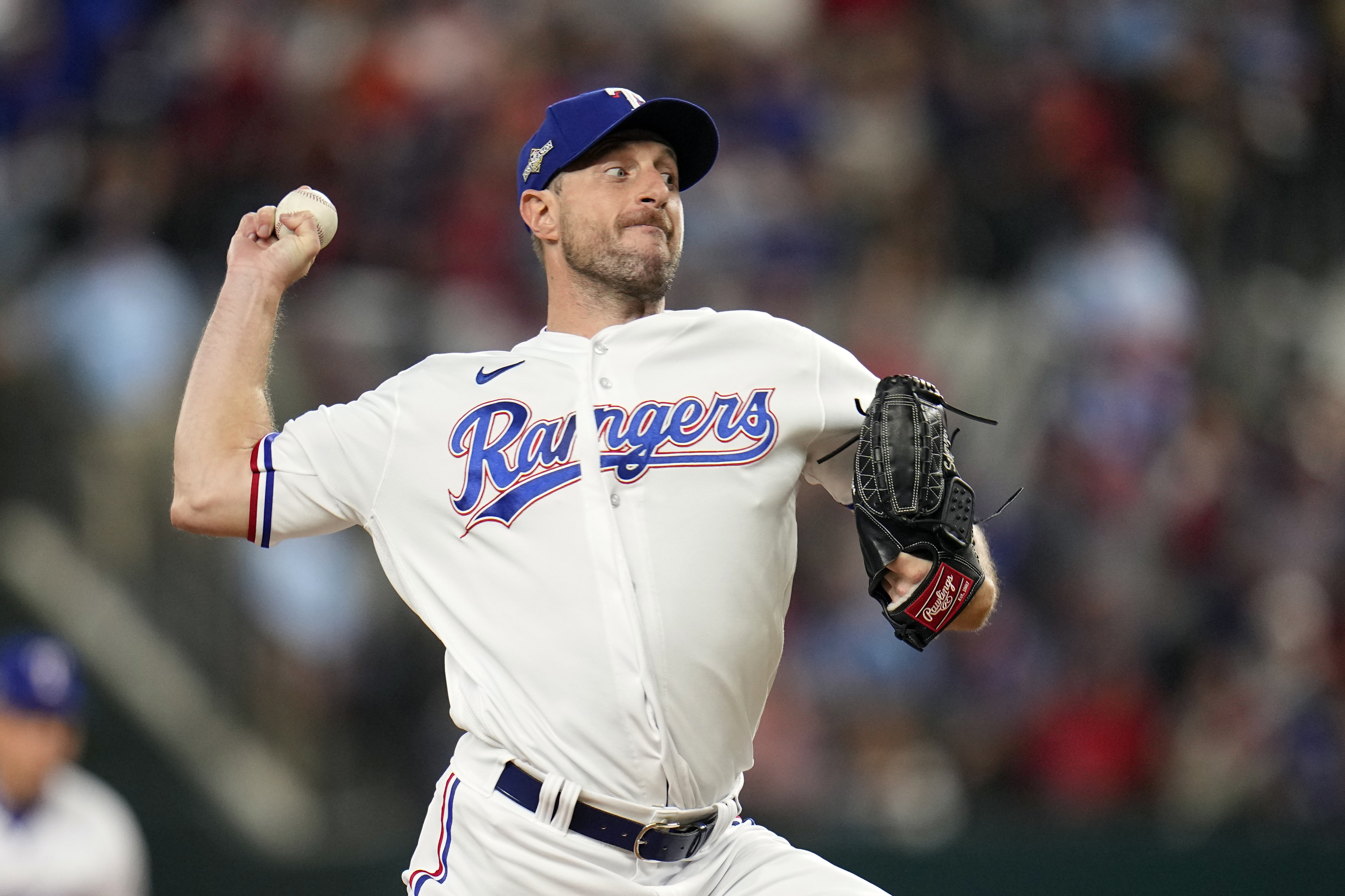 Texas Rangers starting pitcher Max Scherzer throws against the Houston Astros during the first inning in Game 3 of the baseball American League Championship Series Wednesday, Oct. 18, 2023, in Arlington, Texas.