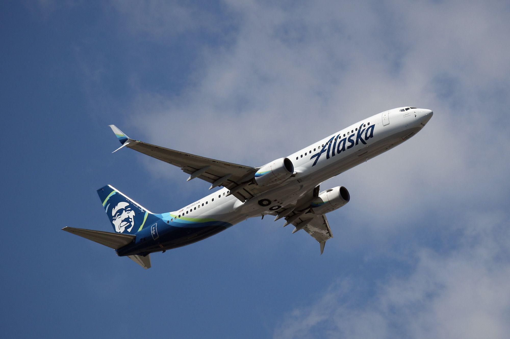 An off-duty pilot inside the cockpit attempted to seize control of an Alaska Airlines plane headed from a Seattle airport to San Francisco on Sunday.