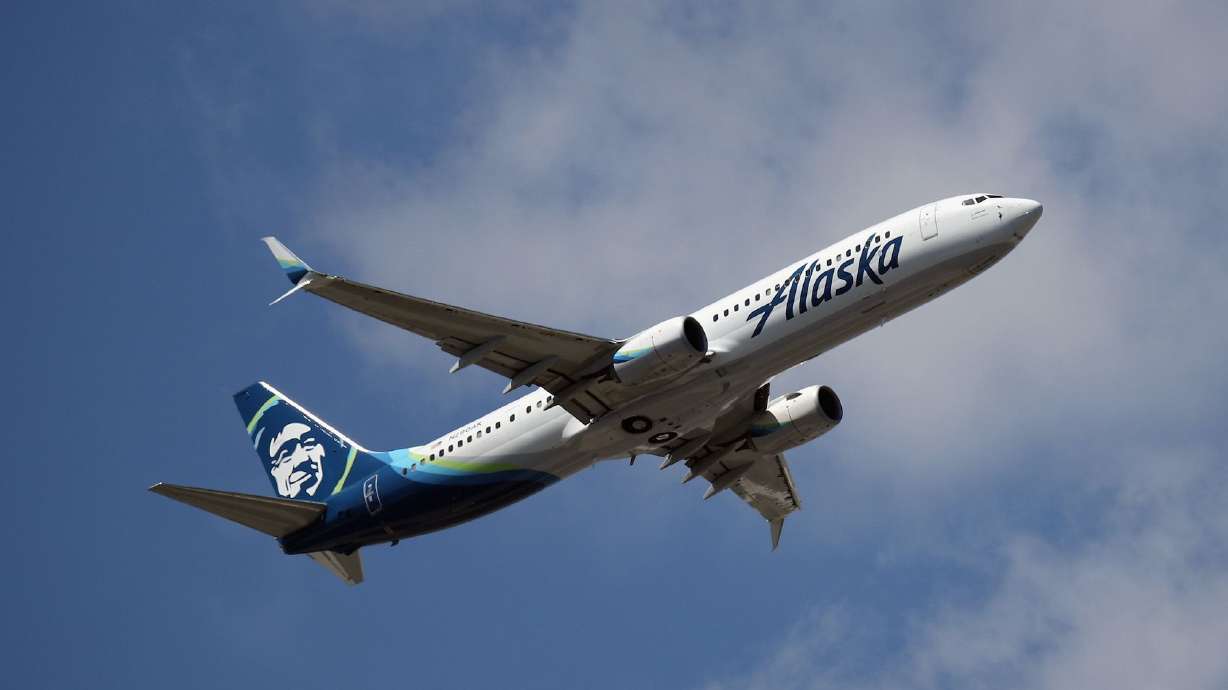 An off-duty pilot inside the cockpit attempted to seize control of an Alaska Airlines plane headed from a Seattle airport to San Francisco on Sunday.