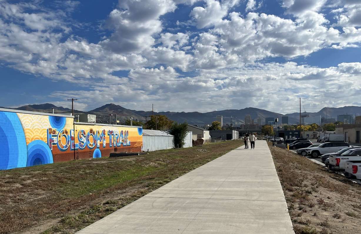People walk on the Folsom Trail near 1000 West in Salt Lake City on Saturday. The trail, which opened in 2022, is in line for many new changes in the future.