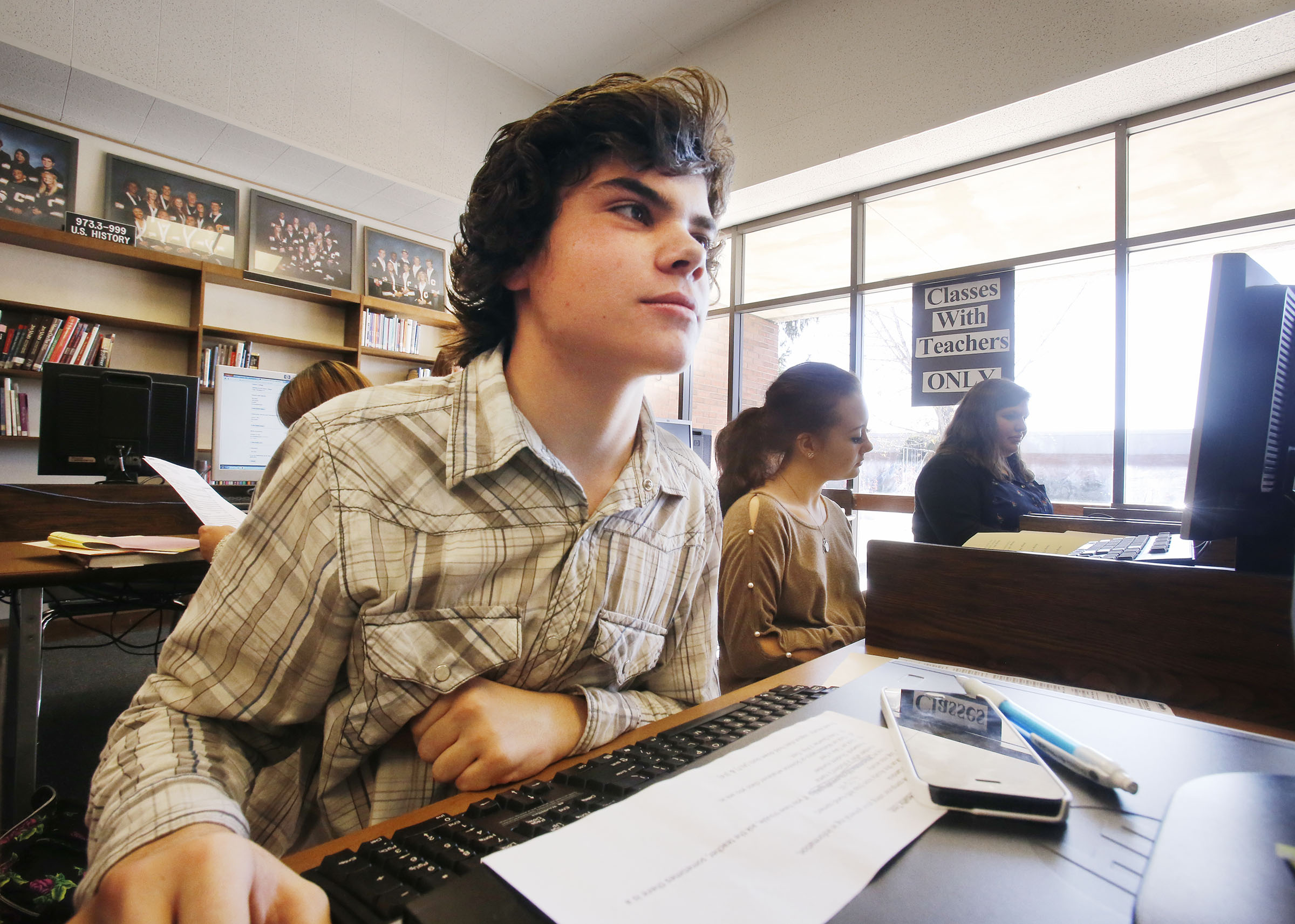 Zach Fritzsche fills out college application forms on Nov. 11, 2013. Utah Tech University and Dixie Technical College partnered with the goal of helping every high school senior in the county complete a college or university application.