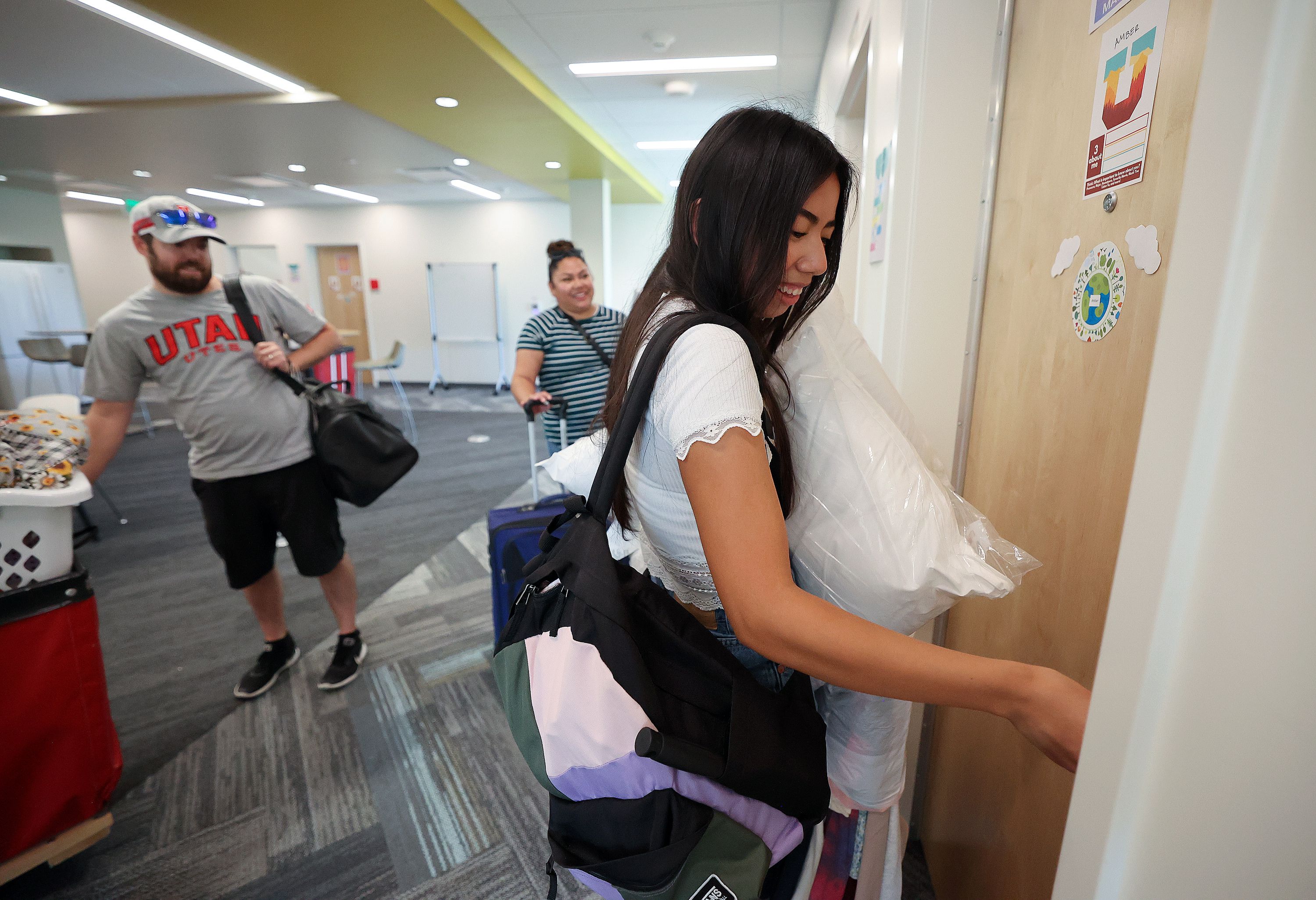 Amber San Miguel unlocks her dorm room as she moves into the University of Utah student housing in Salt Lake City on Aug. 16. Incoming first-year students who apply for housing at the U. by May 3 will be guaranteed a bed on campus.