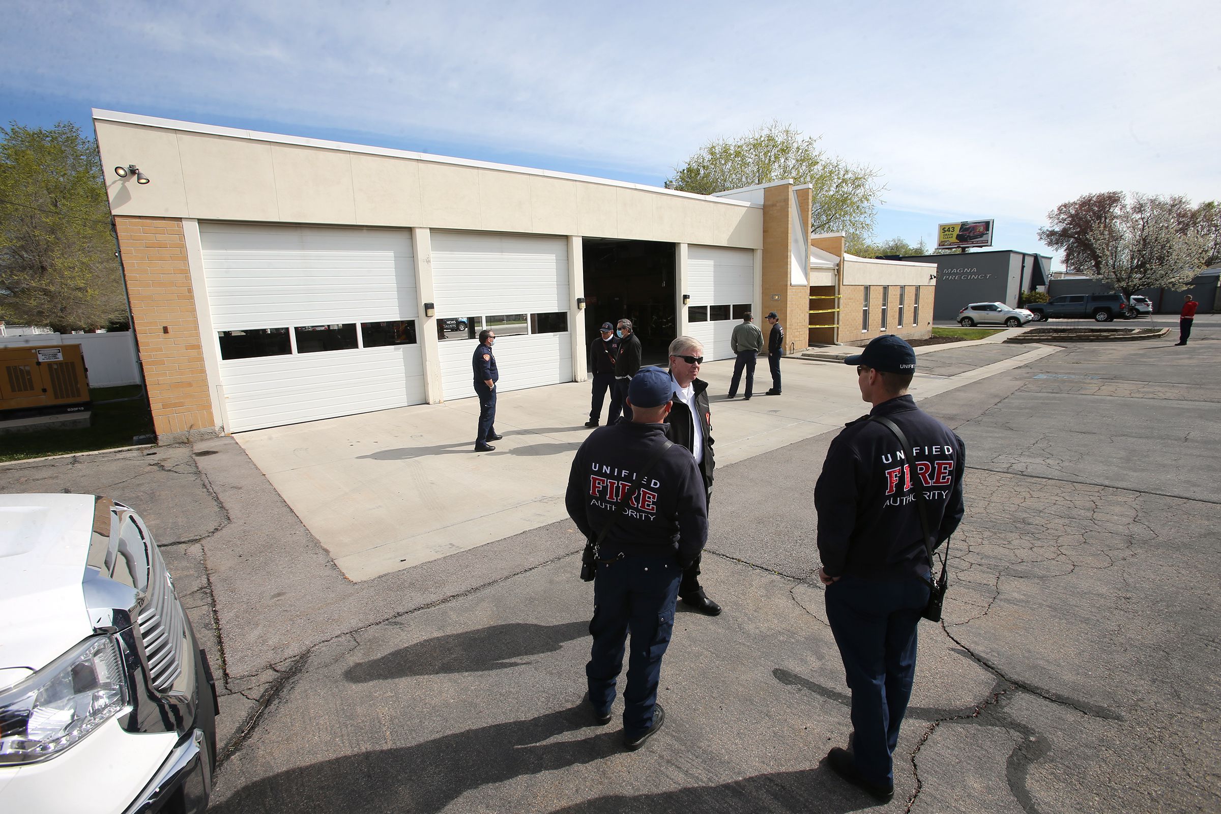 Unified Fire Authority firefighters stand outside Station 102 in Magna on Friday, April 17, 2020. Unified officials announced Friday that the crews at the station, 8609 W. Main, will relocate to Station 111, 8215 W. 3500 South, less than 2 miles away, due to concerns over the recent increase in seismic activity in the area.