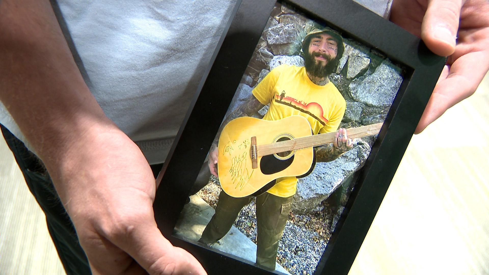 Post Malone donated a signed guitar to the Cottonwood Heights Police Department for auction to raise money for Utah Honor Flights.