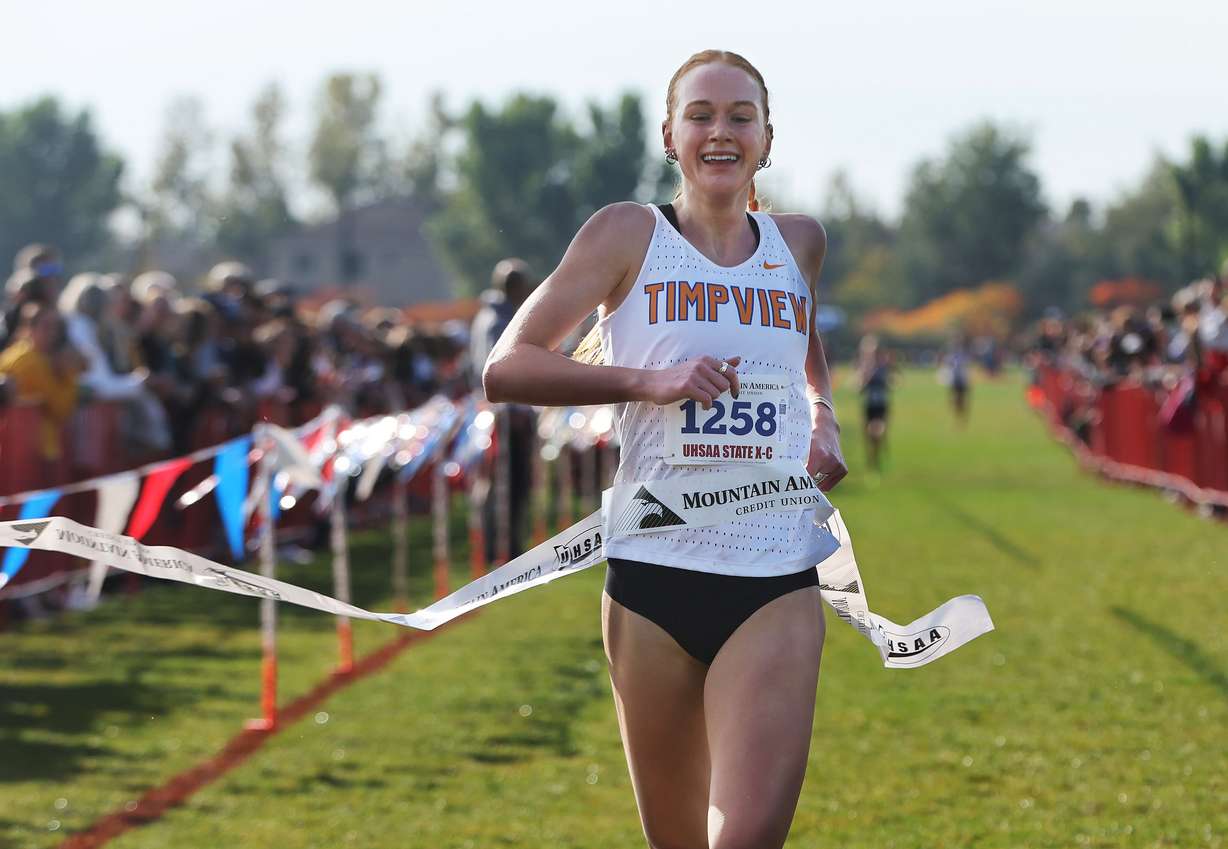 Jane Hedengren of Timpview crossed the finish line to win the 5A girls cross-country state championship race at the Regional Athletic Complex in Rose Park on Tuesday, Oct. 24, 2023.