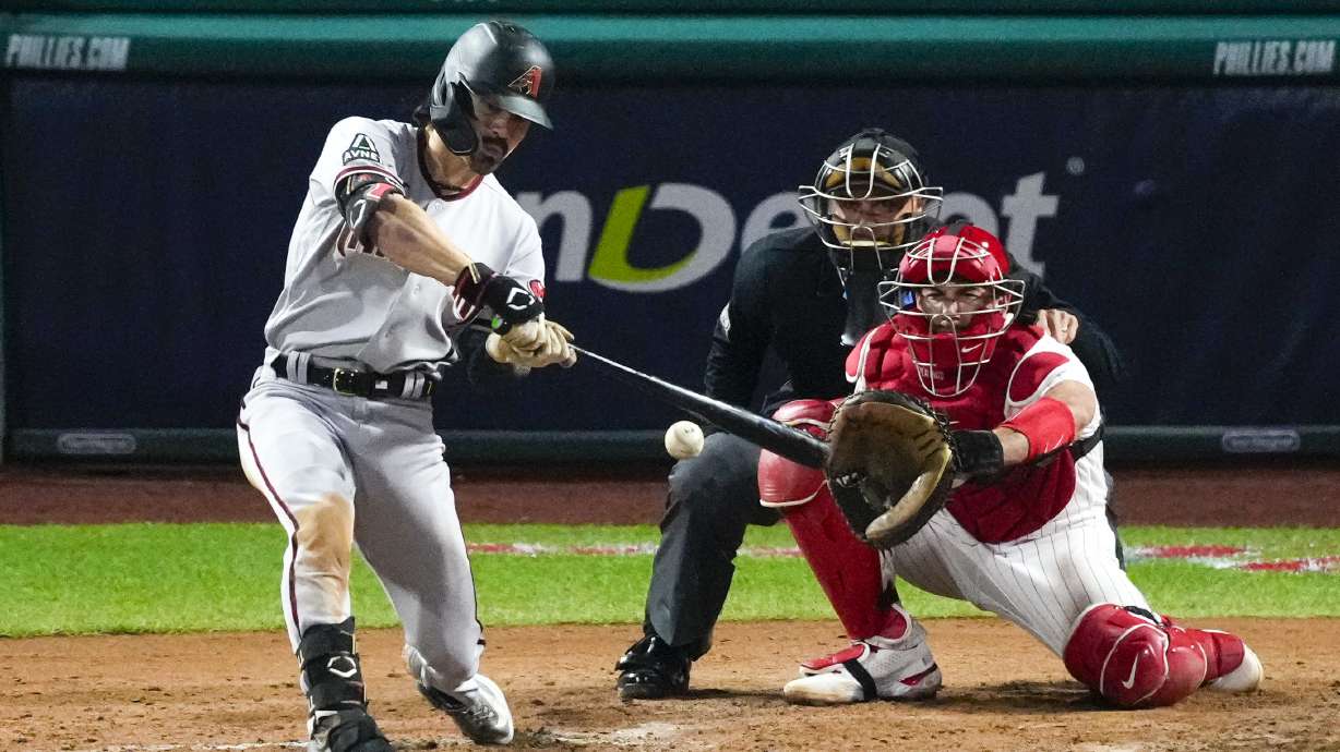 Arizona Diamondbacks' Corbin Carroll hits an RBI single against the Philadelphia Phillies during the fifth inning in Game 7 of the baseball NL Championship Series in Philadelphia on Tuesday, Oct. 24, 2023.