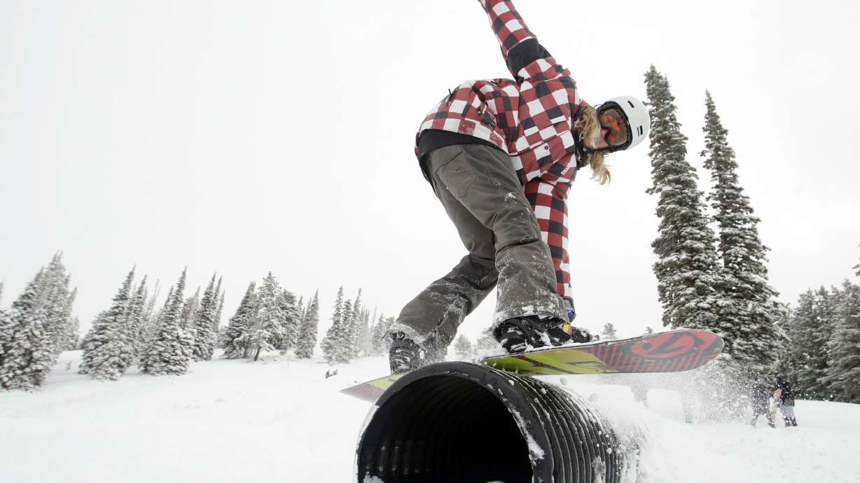 Mitch Wayment snowboards on the fresh snow at Powder Mountain in northern Utah on Oct. 23, 2012. The resort earned a top ranking by Ski Magazine in 2023.