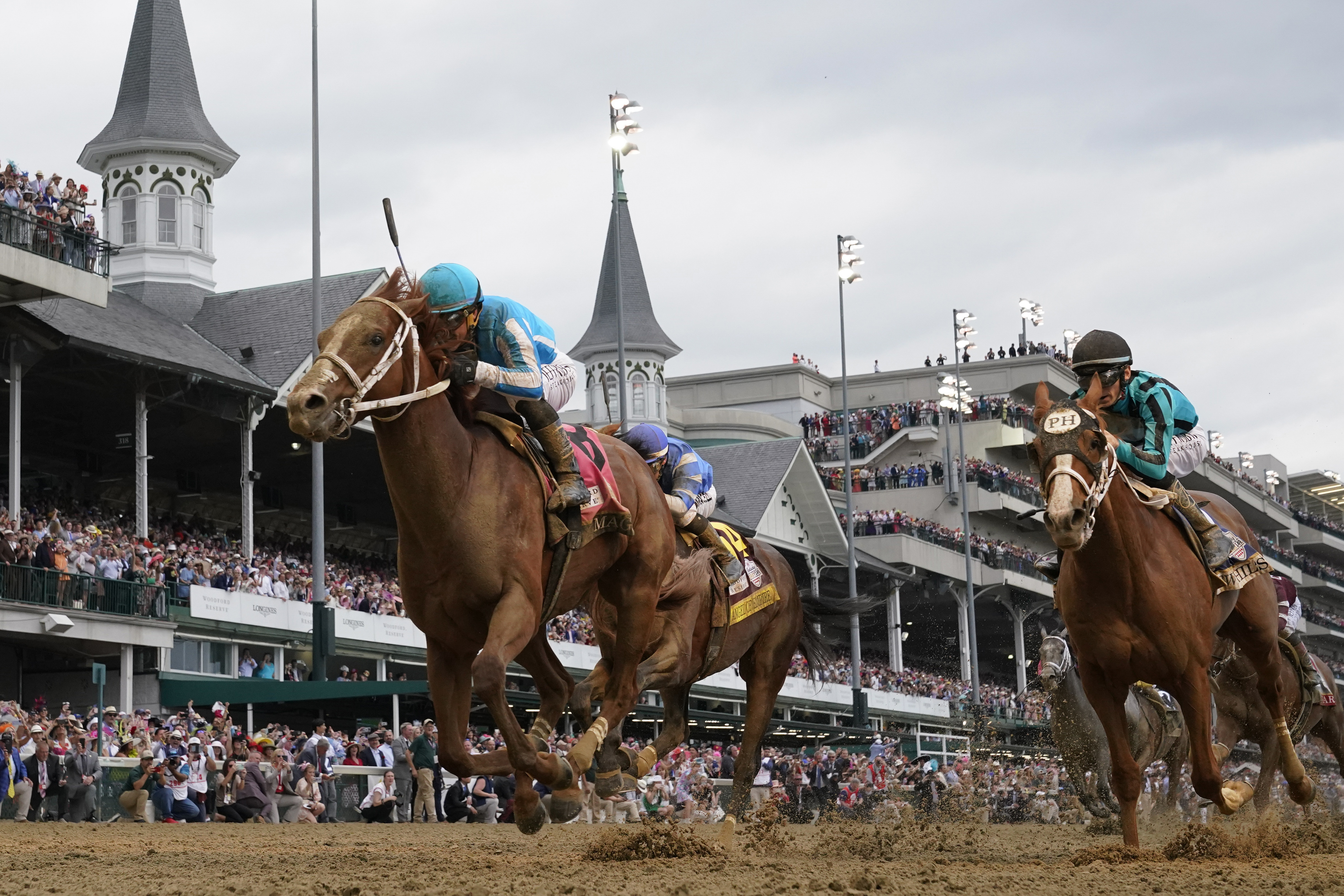 FILE - Mage (8), with Javier Castellano aboard, wins the 149th running of the Kentucky Derby horse race at Churchill Downs Saturday, May 6, 2023, in Louisville, Ky. Kentucky Derby winner Mage and Belmont Stakes winner Arcangelo head a full field of 14 horses for the wide-open Breeders' Cup Classic. 