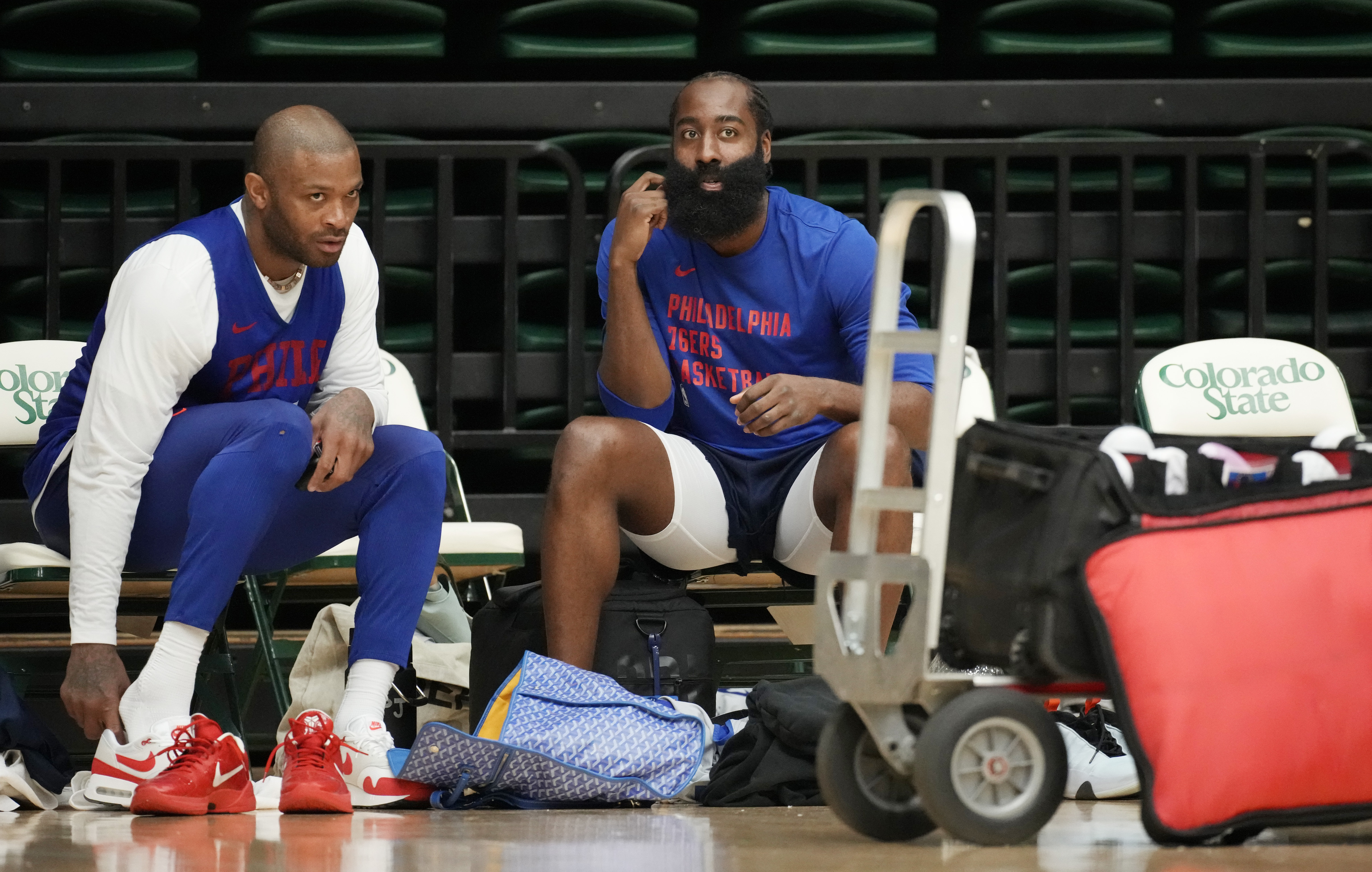 Philadelphia 76ers forward P.J. Tucker, left, talks with guard James Harden during the NBA basketball team's practice on Thursday, Oct. 5, 2023, in Fort Collins, Colo.