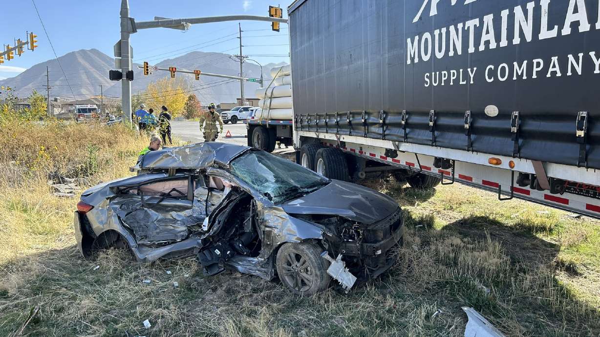 A woman was critically injured in a crash involving a semitruck and a car in Spanish Fork on Wednesday afternoon.