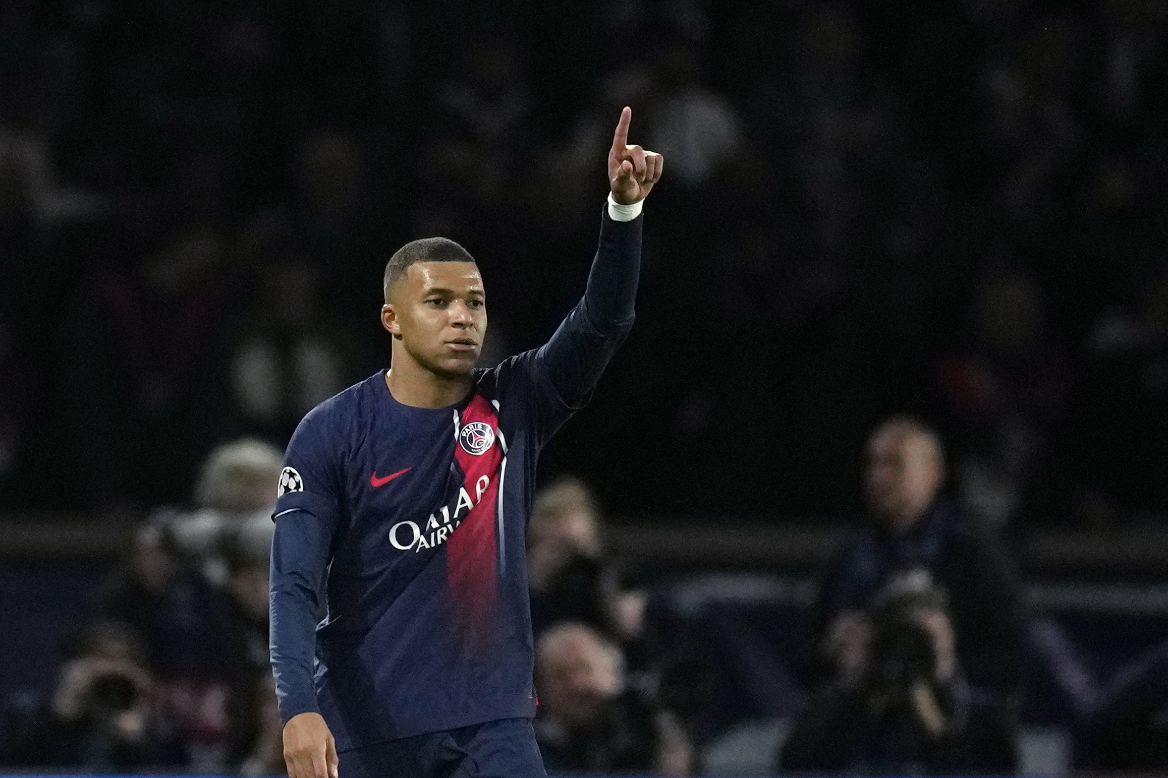 PSG's Kylian Mbappe celebrates after scoring his side's opening goal during the Champions League group F soccer match between Paris Saint Germain and AC Milan at Parc des Princes stadium in Paris, Wednesday, Oct. 25, 2023.