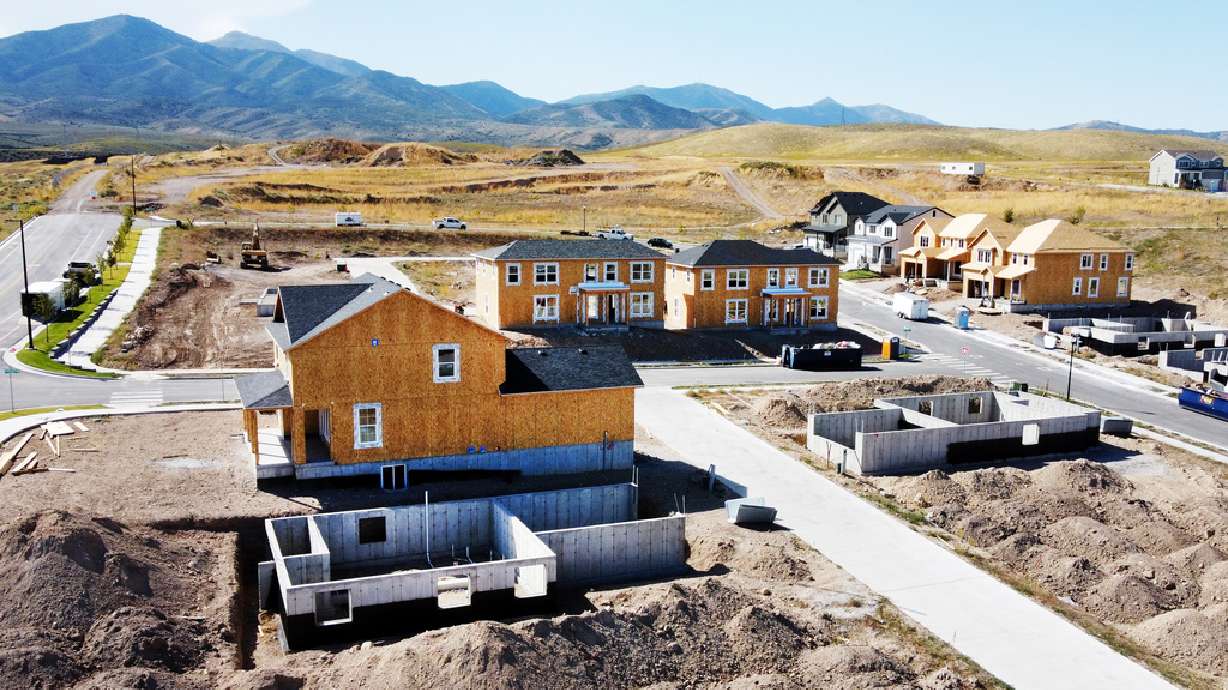New single family homes under construction in the South Jordan area of the Salt Lake Valley on Sept. 11. Homes and businesses are the targets of fraudsters who attempt to take control of the property by changing state records.