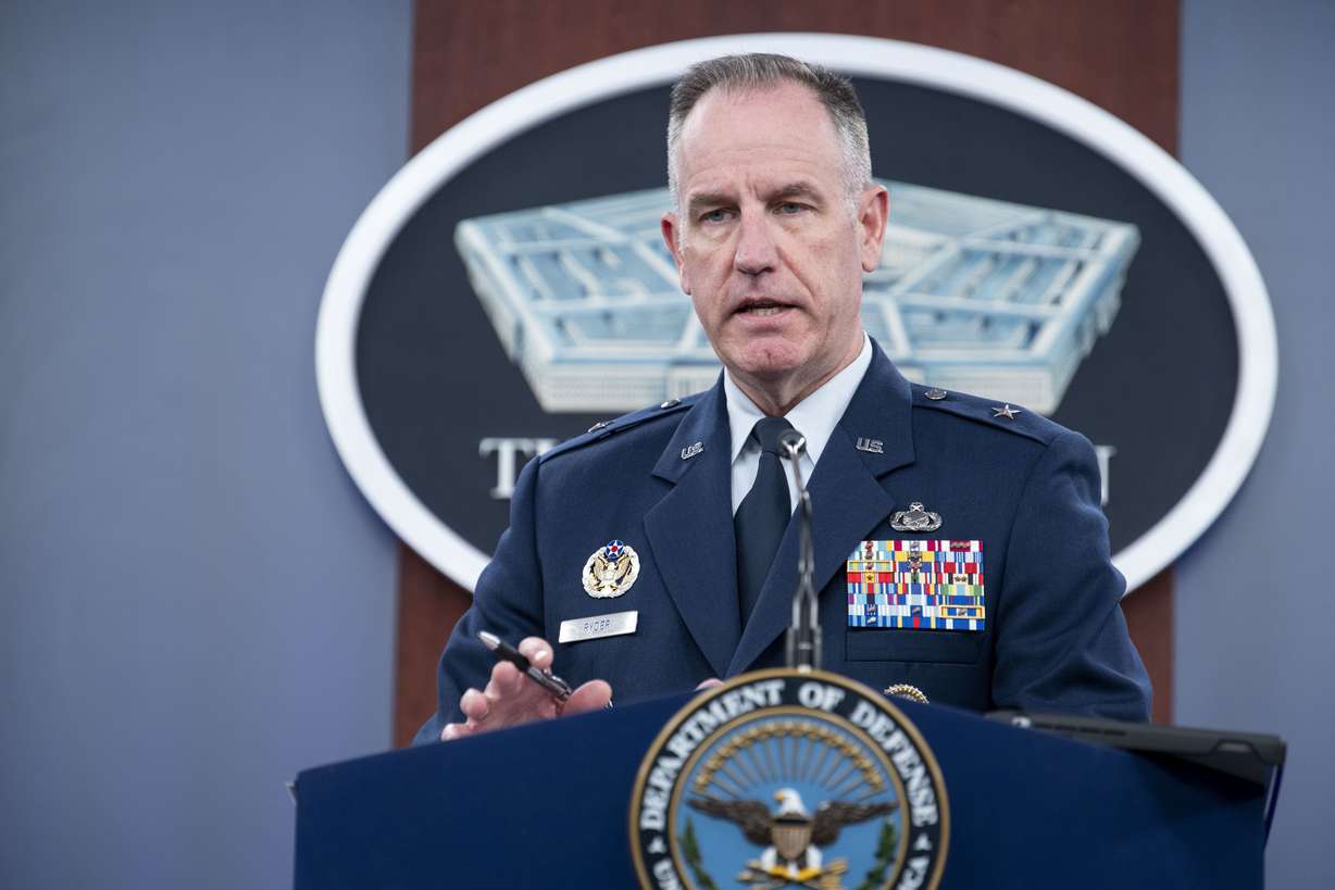 Pentagon spokesman Air Force Brig. Gen. Patrick Ryder speaks at the Pentagon on Thursday in Washington. The U.S. military launched airstrikes early Friday on two locations in eastern Syria linked to Iran's Revolutionary Guard Corps, the Pentagon said, in retaliation for a slew of drone and missile attacks against U.S. bases and personnel in the region that began early last week.