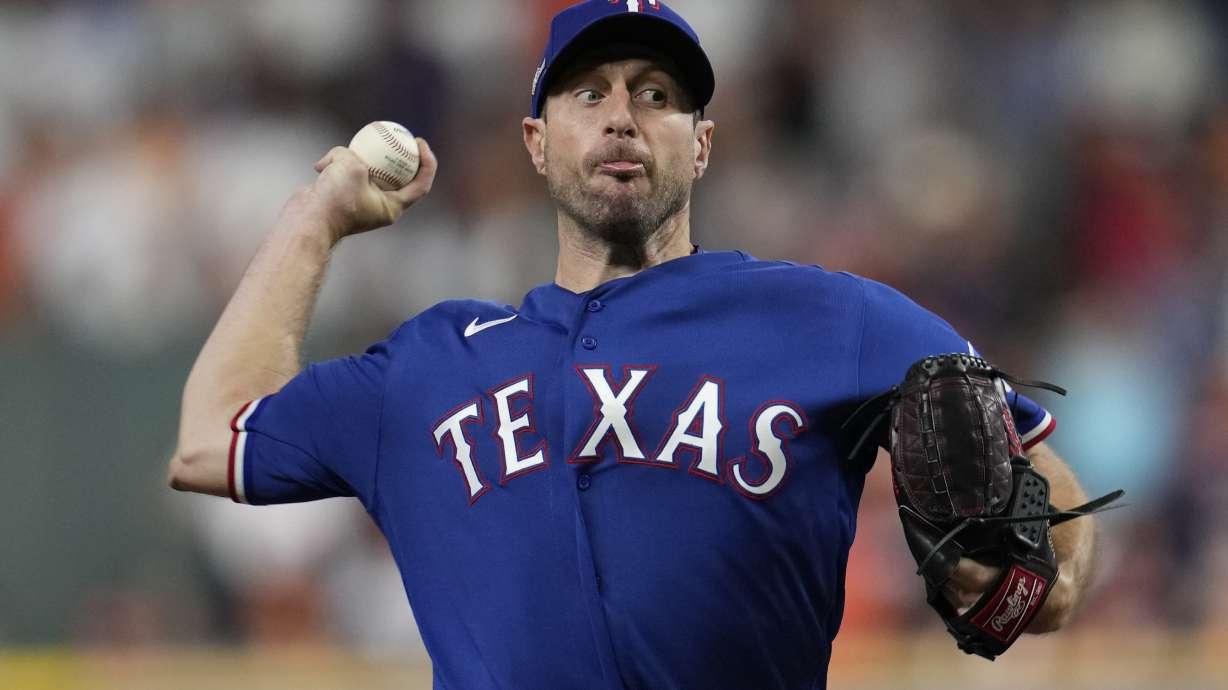 Texas Rangers starter Max Scherzer throws during the first inning of Game 7 of the baseball AL Championship Series against the Houston Astros Monday, Oct. 23, 2023, in Houston.