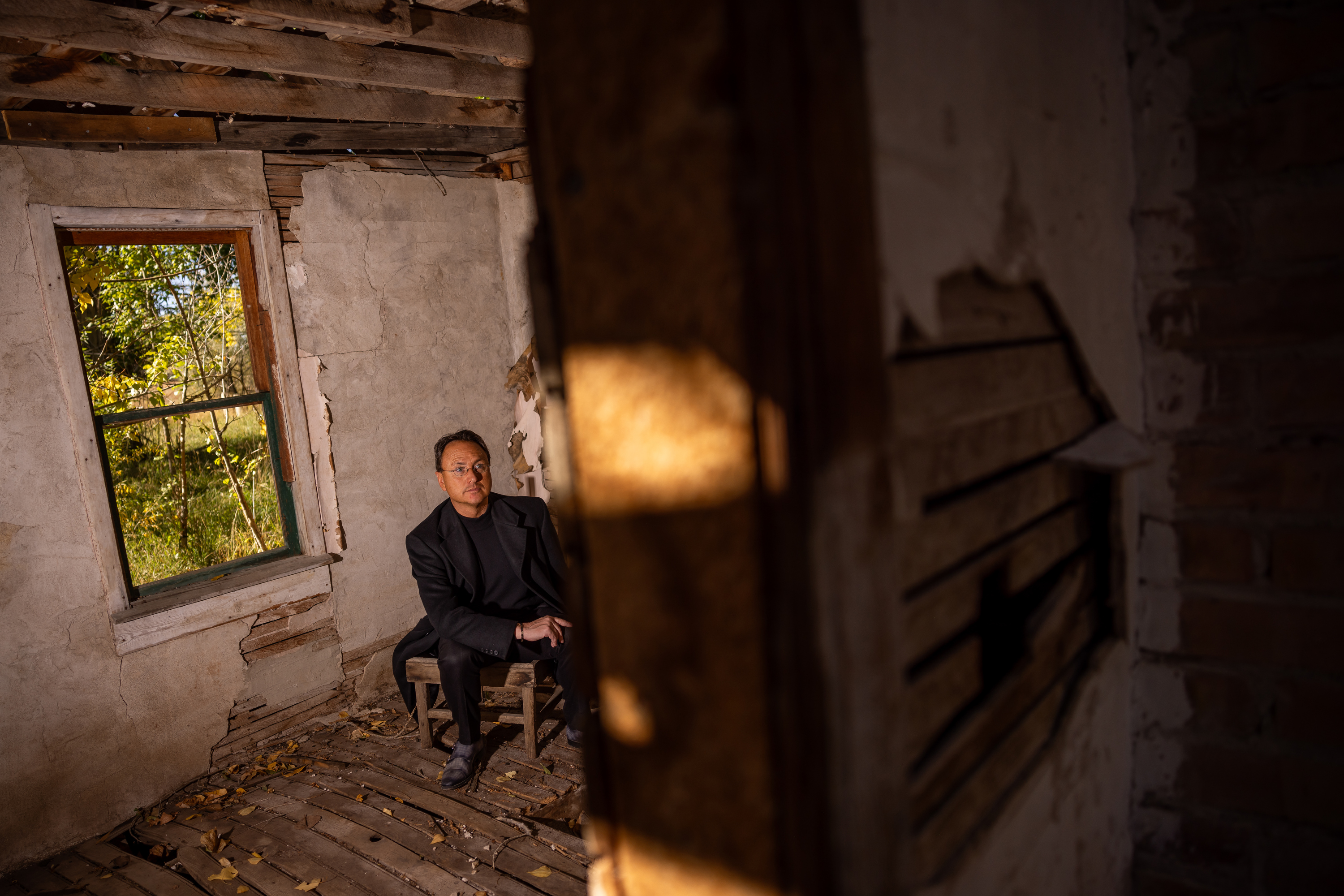 Brandon Fugal, owner of Skinwalker Ranch, poses for a photo at Homestead Three, one of several building sites on the property in rural Uintah County on Oct. 5.