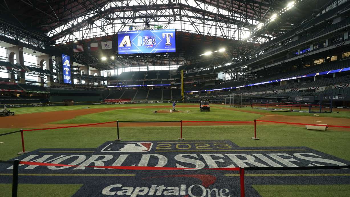 Signage is seen near the infield at Globe Life Field ahead of the World Series between the Texas Rangers and the Arizona Diamondbacks, Wednesday, Oct. 25, 2023, in Arlington, Texas.
