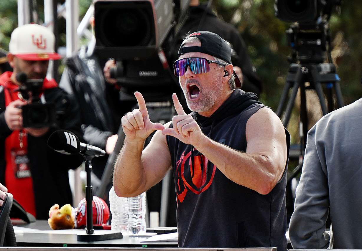 Utah head coach Kyle Whittingham flashes his “U” as he appears on the "Pat McAfee Show" at the University of Utah in Salt Lake City on Friday, Oct. 27, 2023.