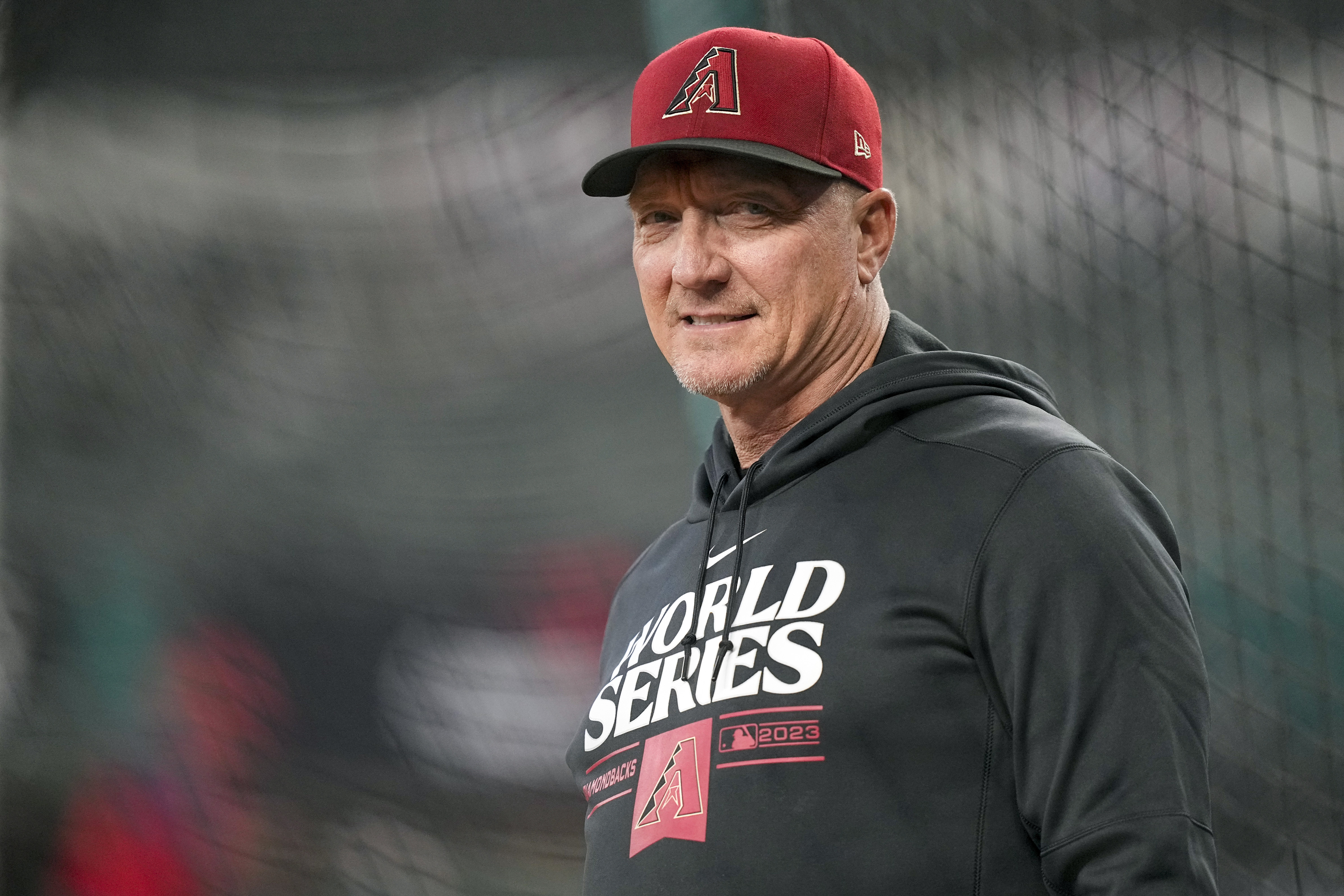 FILE - Arizona Diamondbacks bench coach Jeff Banister watches during World Series baseball media day Thursday, Oct. 26, 2023, in Arlington, Texas. Banister envisioned being part of a World Series at Globe Life Field even before ground was broken on the retractable-roof stadium that is the home of the Texas Rangers. That dream is being realized now, just happening in a different role than anticipated for the bench coach of the Arizona Diamondbacks. 