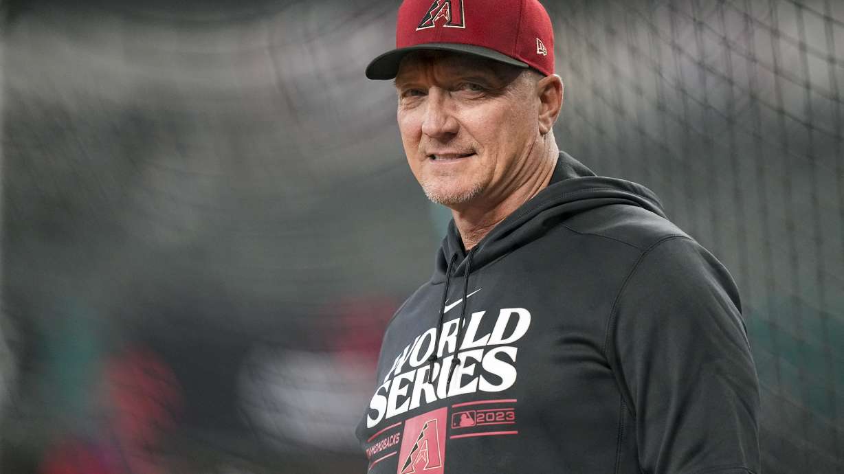 FILE - Arizona Diamondbacks bench coach Jeff Banister watches during World Series baseball media day Thursday, Oct. 26, 2023, in Arlington, Texas. Banister envisioned being part of a World Series at Globe Life Field even before ground was broken on the retractable-roof stadium that is the home of the Texas Rangers. That dream is being realized now, just happening in a different role than anticipated for the bench coach of the Arizona Diamondbacks.