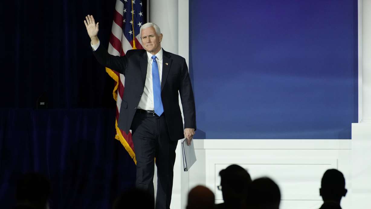 Former Vice President Mike Pence arrives to speak at an annual leadership meeting of the Republican Jewish Coalition, Saturday, in Las Vegas. Pence said he is dropping his bid for the Republican presidential nomination, ending his campaign for the White House after struggling to raise money and gain traction in the polls.