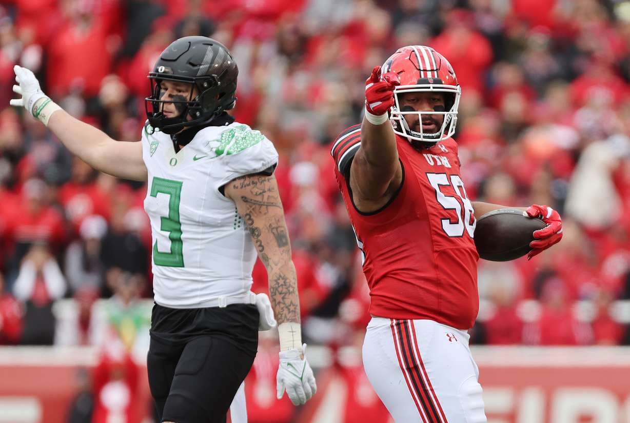 Utah Utes defensive tackle Junior Tafuna (58) recovers a fumble against Oregon in Salt Lake City on Saturday, Oct. 28, 2023. Oregon won 35-6.
