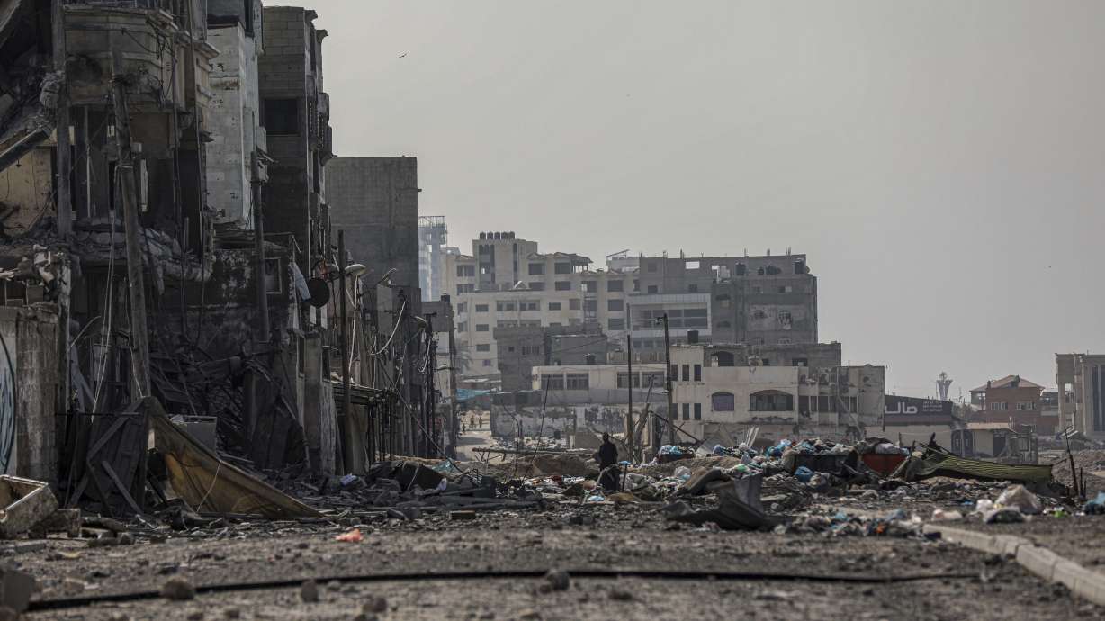 Damage to buildings caused by the ongoing Israeli airstrikes on Gaza City, Saturday. Nearly three dozen trucks entered Gaza Sunday in the largest aid convoy since the war between Israel and Hamas began.