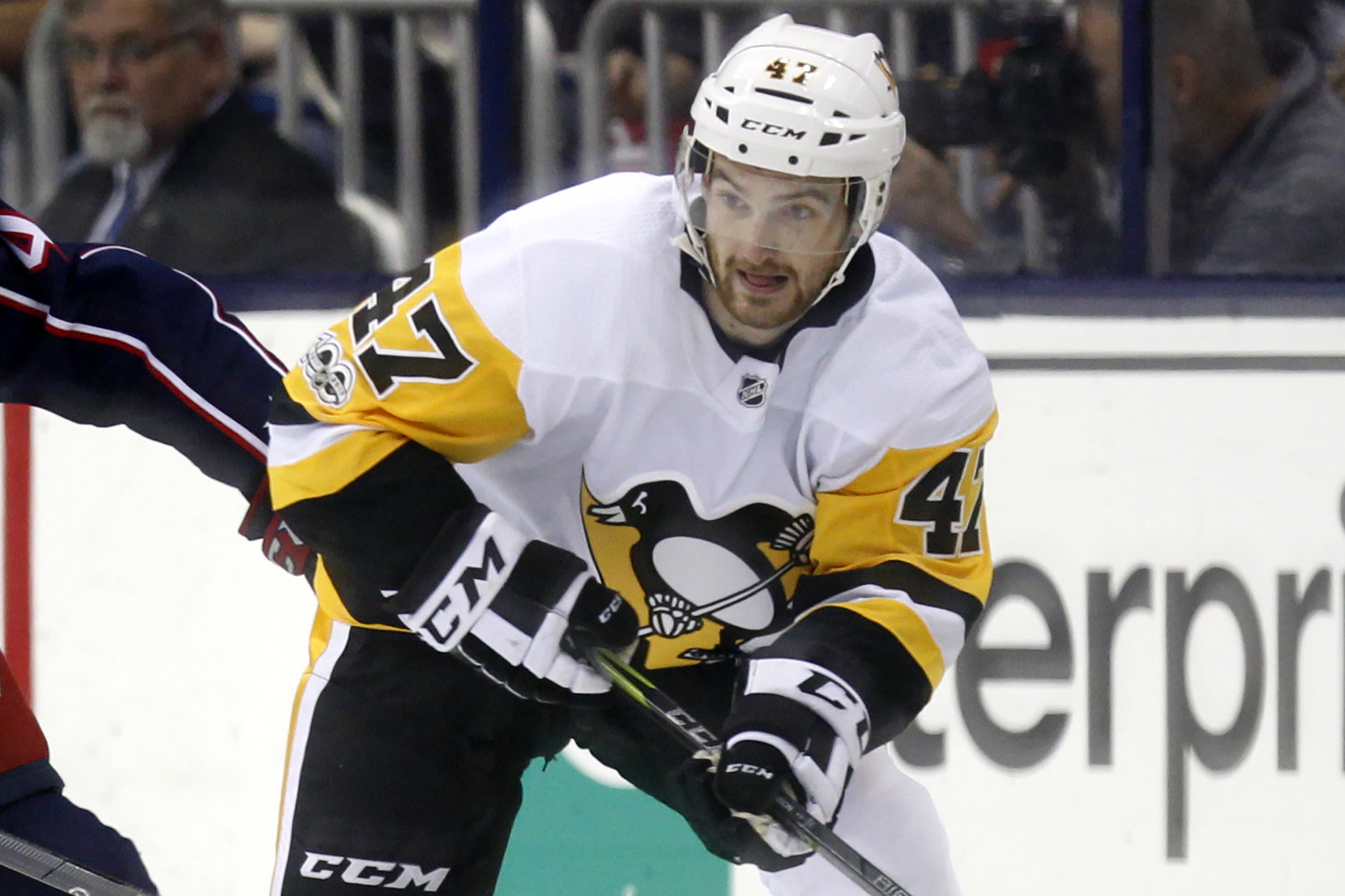 FILE - Pittsburgh Penguins forward Adam Johnson in action during an NHL hockey game in Columbus, Ohio, Friday, Sept. 22, 2017. American hockey player Adam Johnson has died after a “freak accident” during a game in England on Saturday, Oct. 28, 2023 his club said. The 29-year-old Minnesota native was playing for the Nottingham Panthers in a Challenge Cup game against the Sheffield Steelers when he suffered a slashed neck during the second period of the game at Sheffield’s Utilita Arena. 