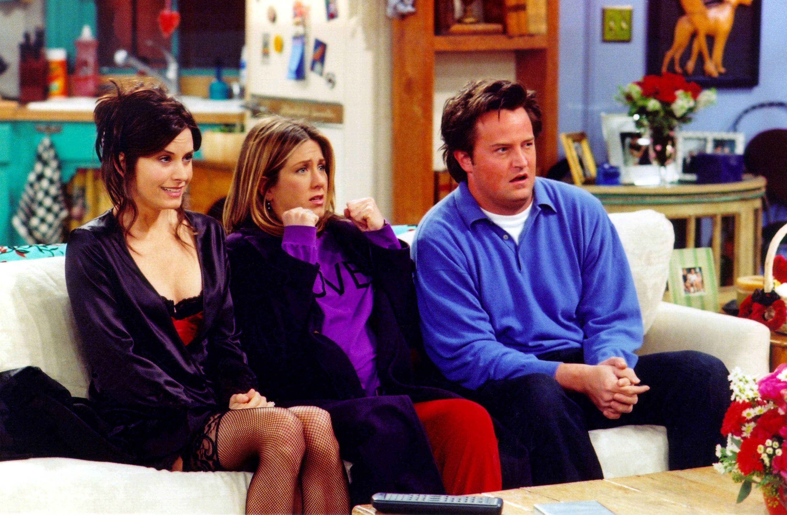 Actors (from left) Courteney Cox, Jennifer Aniston and Matthew Perry are shown in a scene from the NBC series "Friends." It could be said that the casting of Matthew Perry in the role that made him a superstar was divinely inspired.