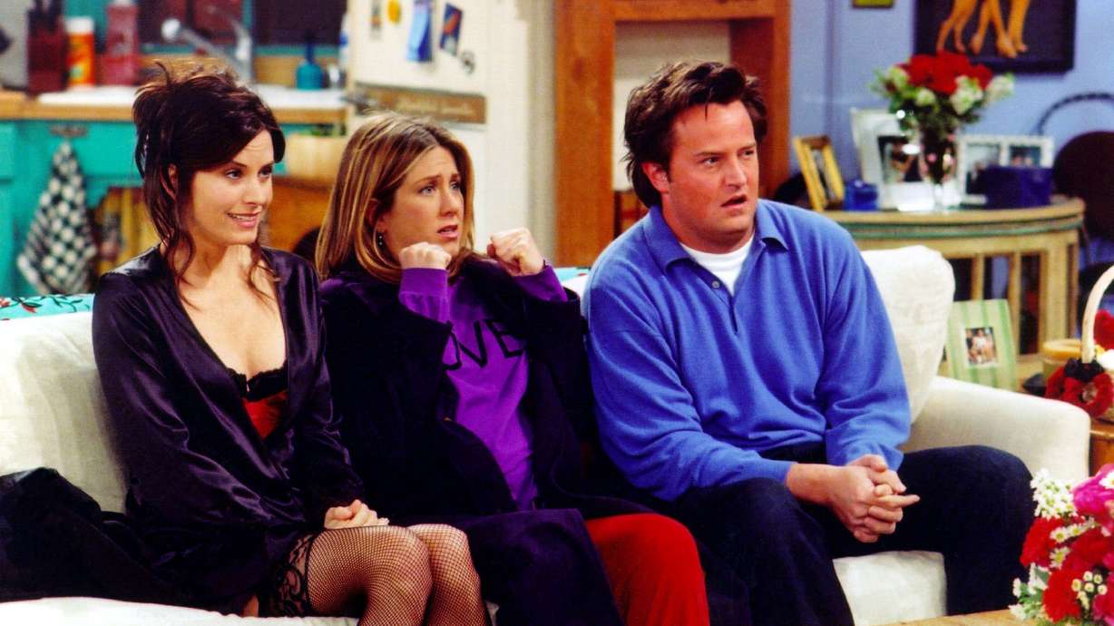 Actors (from left) Courteney Cox, Jennifer Aniston and Matthew Perry are shown in a scene from the NBC series "Friends." It could be said that the casting of Matthew Perry in the role that made him a superstar was divinely inspired.