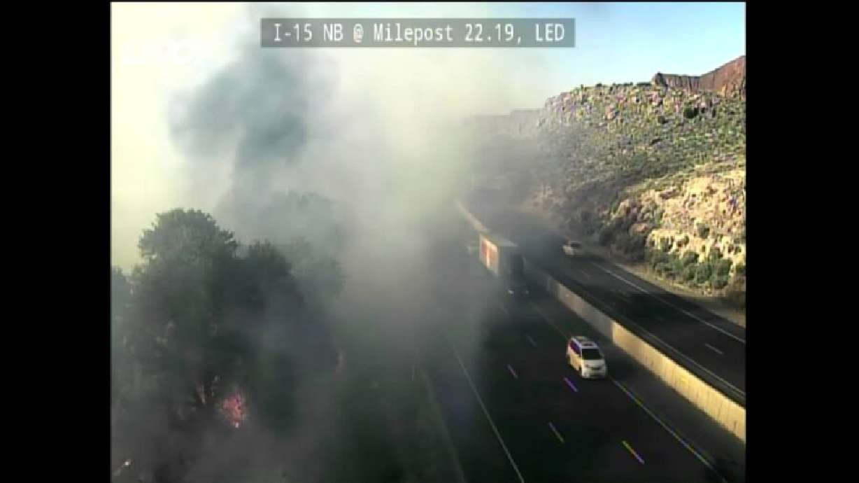 Utah Department of Transportation camera captures an image of a brush fire that forced the shutdown of the northbound lanes of I-15, starting near the town of Leeds in Washington County, on Sunday.